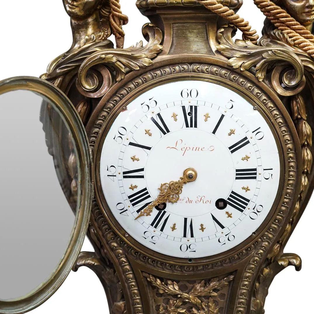 19th century French Ormolu Bronze Wall Clock and Barometer by Lepine, Paris, France, of a grand scale, each 39 inches tall and 16 1/2 inches across.