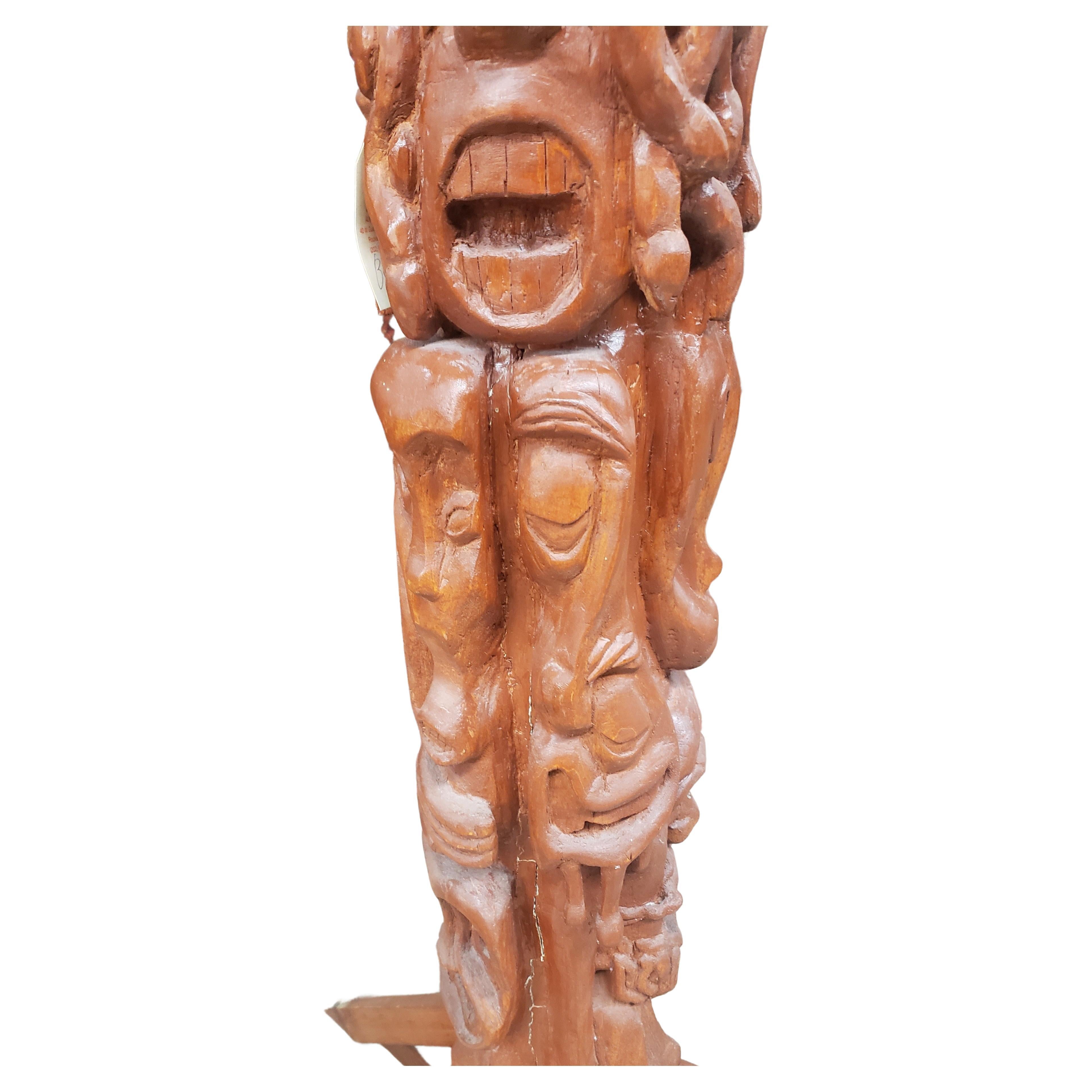 A very large 19th century North-Western Indian figural Carved Wood Totem Pole.
This very rare Pole measures 8