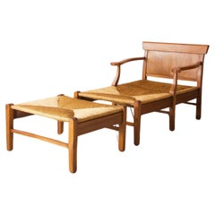 Used Very large 20th century French lounge chair and footstool