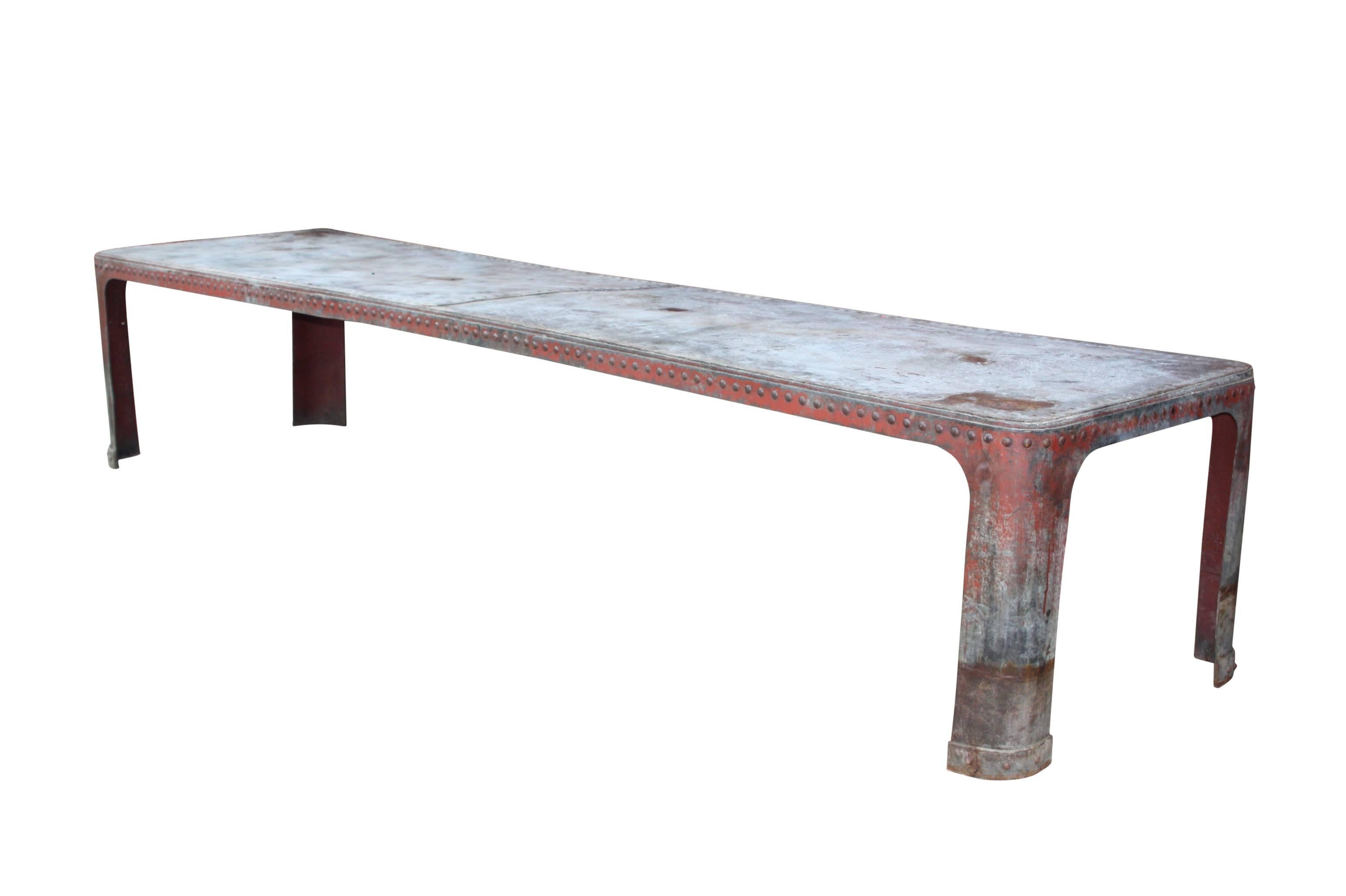 A very large galvanised steel rustic looking tank table, last owned by Jamie Oliver.