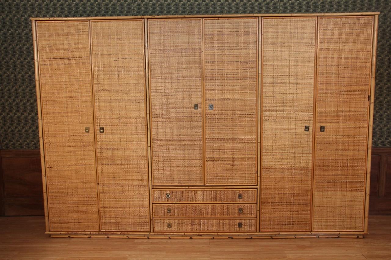 large wardrobe 6 doors and 3 drawers in bamboo and rattan from the house viva del sud work in very good condition from the house viva del sud brass handles