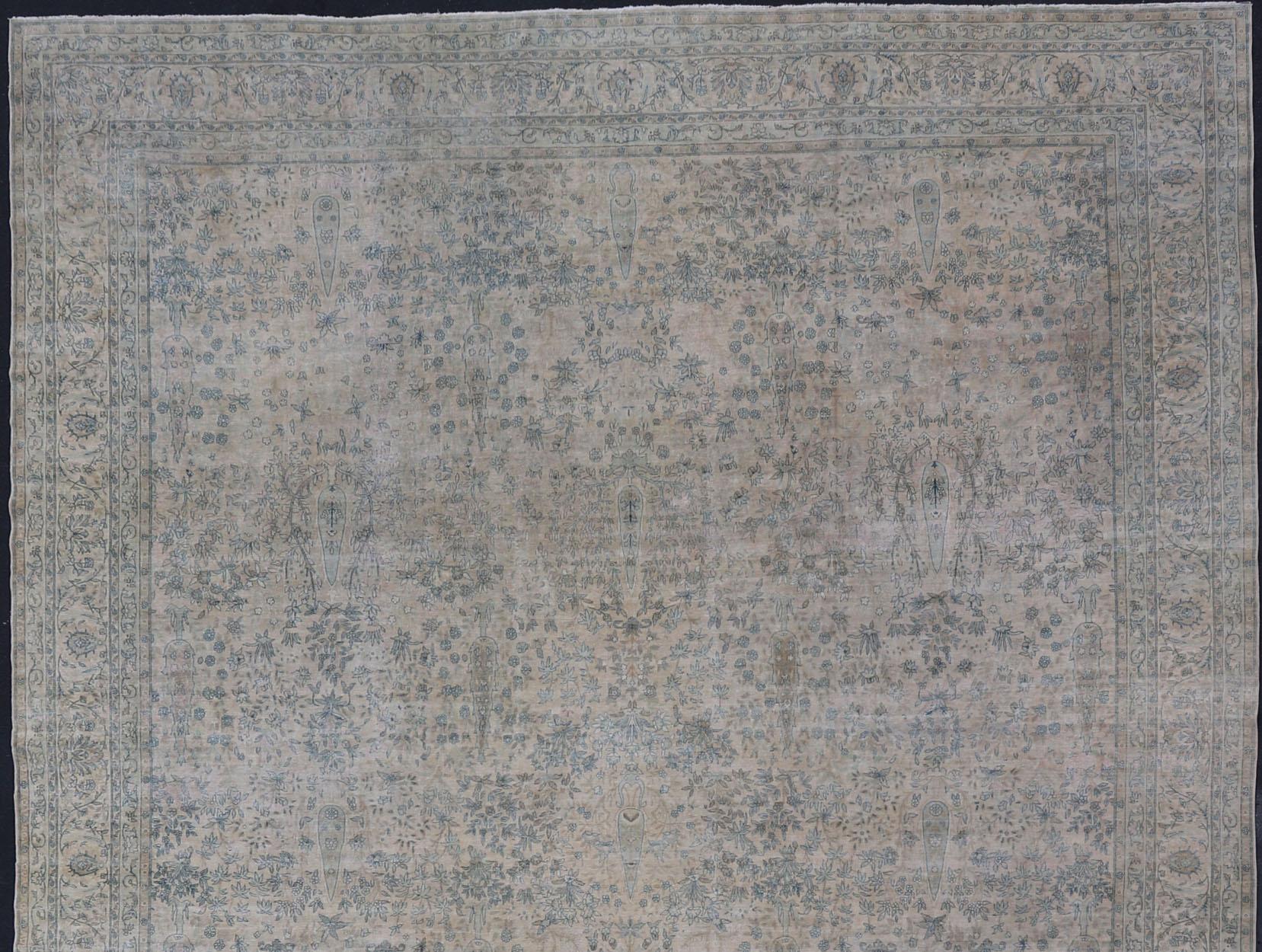 Mansion sized antique Amritsar rug in blush, light blue, light brown, medium blue, gray and ivory. rug/B-0410

Measures: 15'2 x 23'

This fabulous palace-sized antique rug displays an all-over design filled with branches, leaves and trees and a