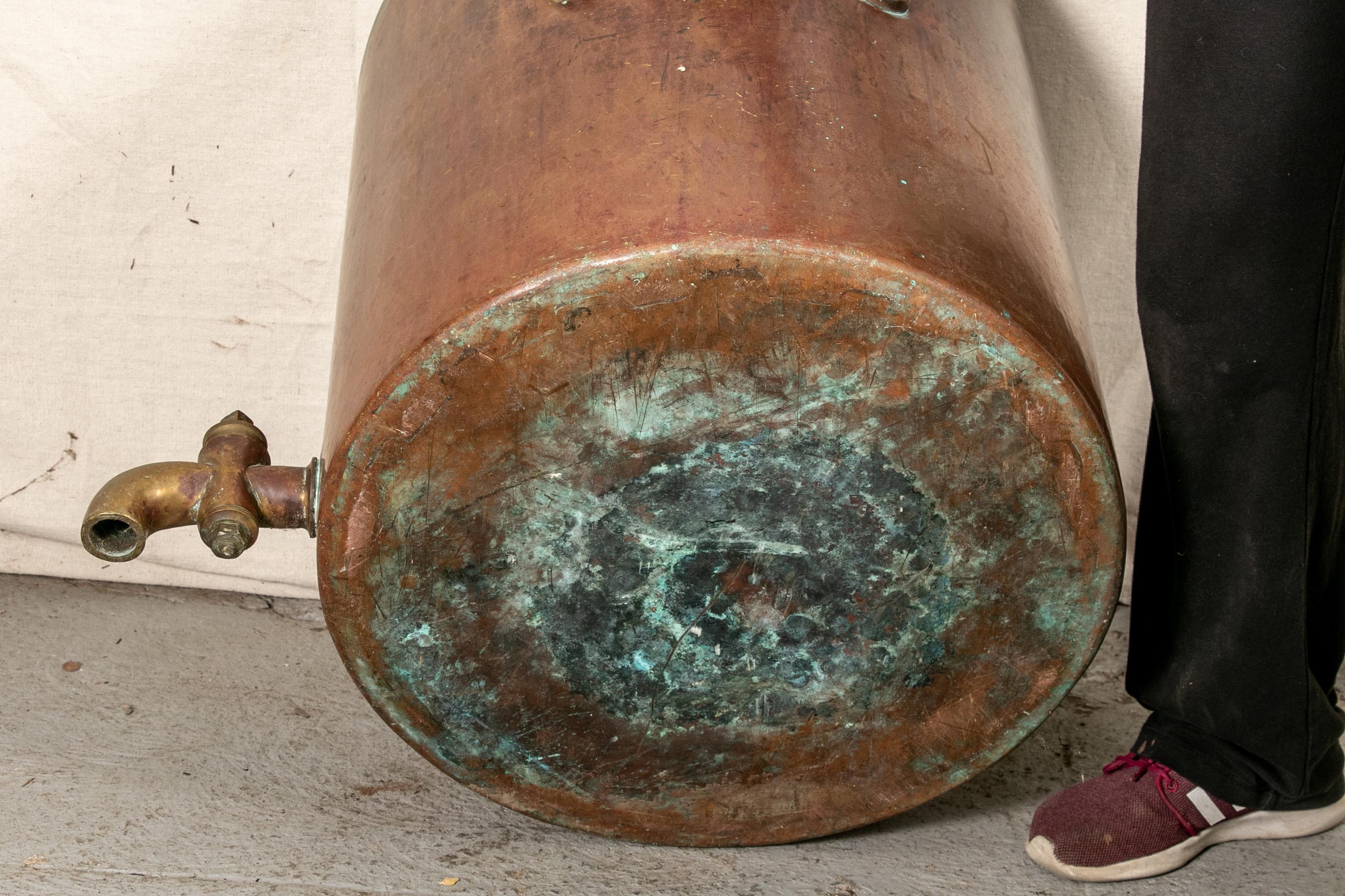old copper water tank