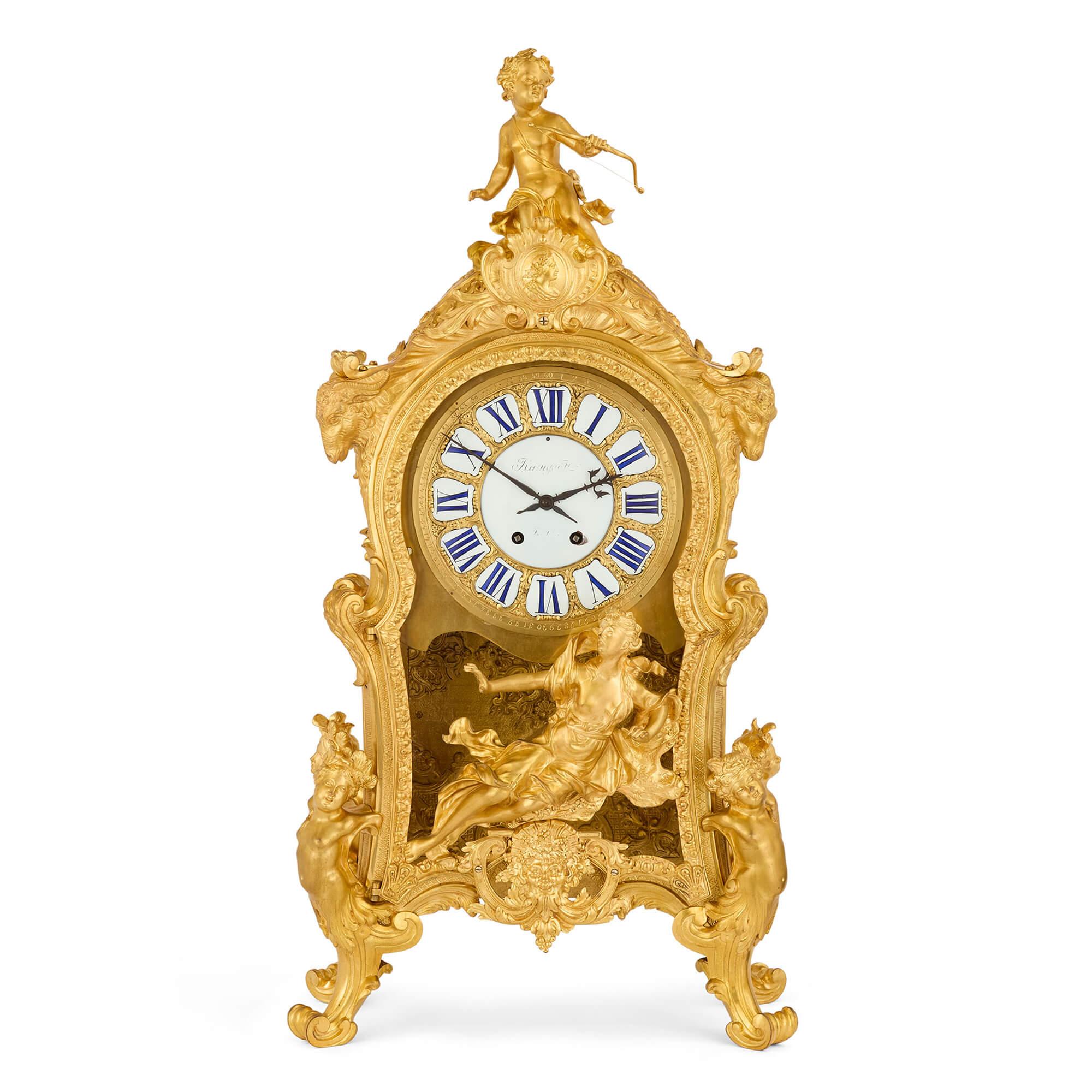 Very large antique Louis XV style mantel clock by Beurdeley and Raingo Frères
French, Late 19th Century
Height 98cm, width 49cm, depth 24cm

This magnificent Louis XV style mantel clock, masterfully crafted from gilded ormolu, is a testament to the