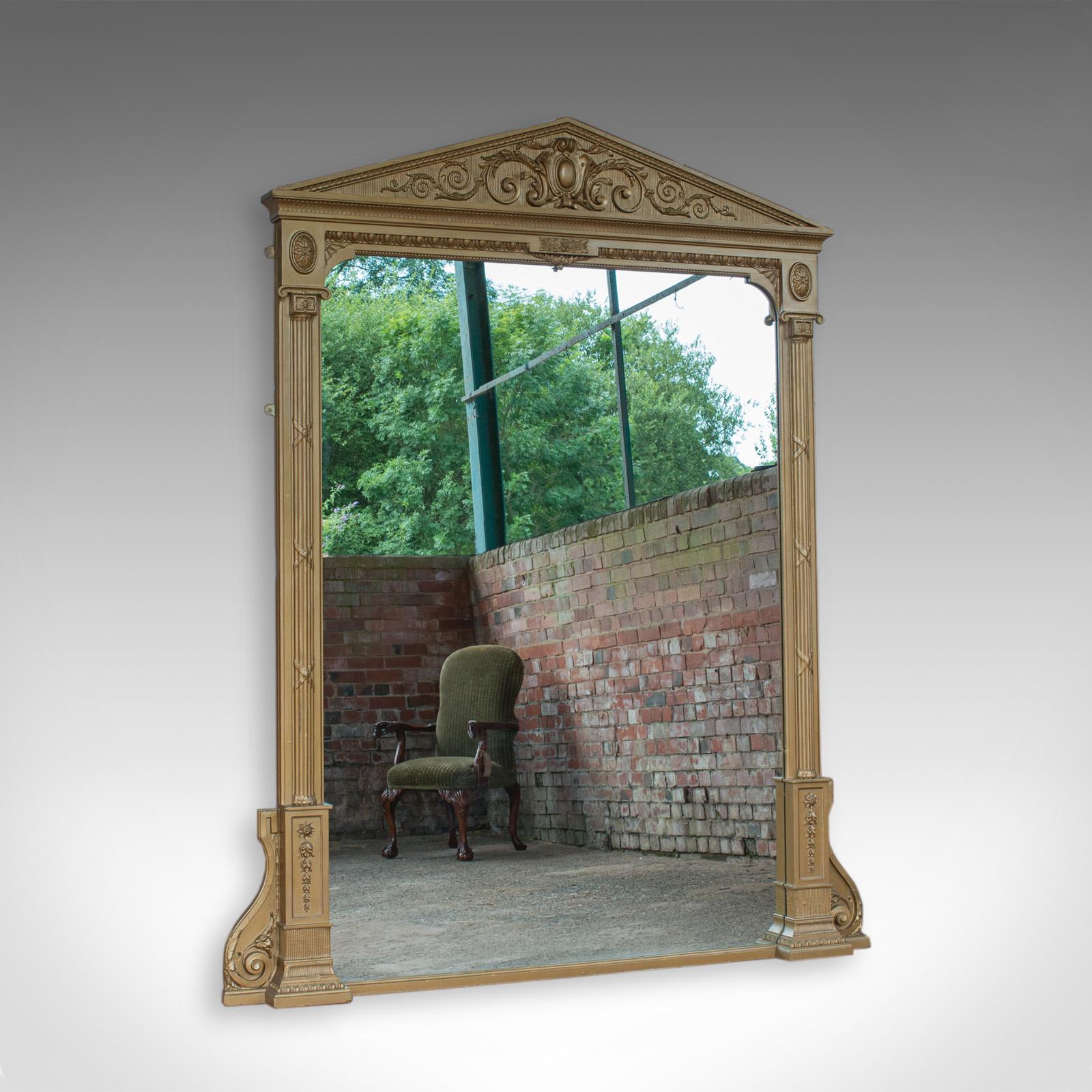 This is a very large antique overmantel mirror. A 230cm (7'5