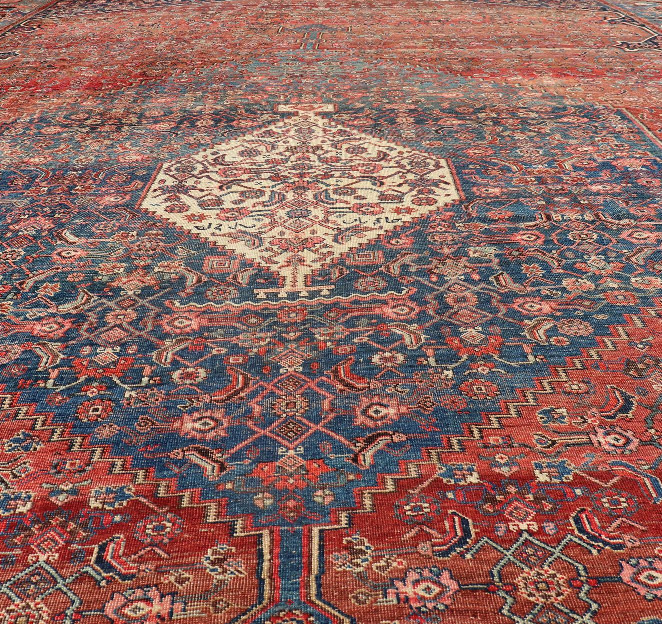 Very Large Antique Persian Bidjar Rug in Multi Shades of Blue, Tera-Cotta & Red In Good Condition For Sale In Atlanta, GA