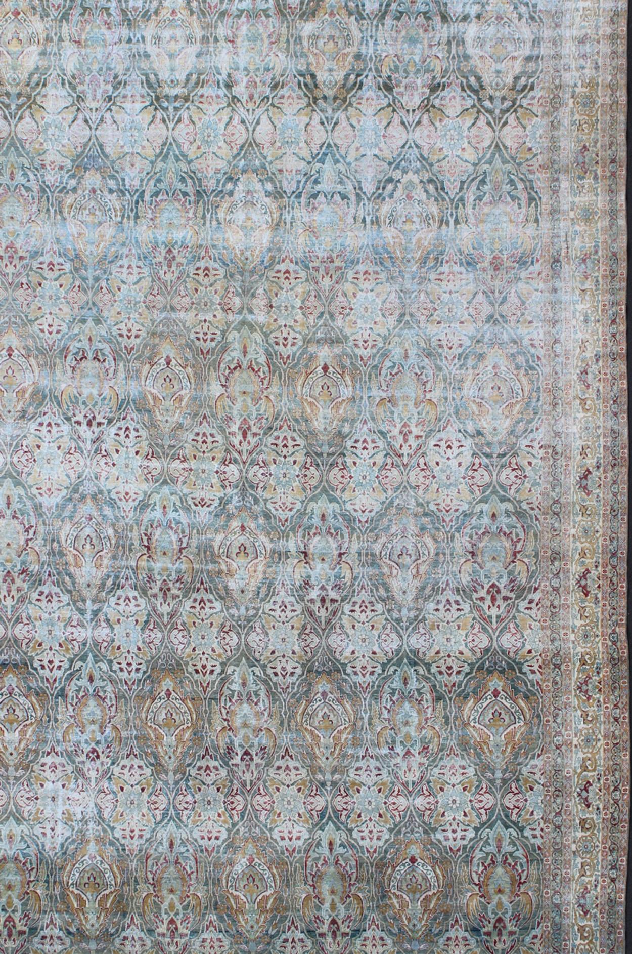 Hand-Knotted Very Large Antique Persian Distressed Lavar Kerman Rug In Large Scale Design For Sale
