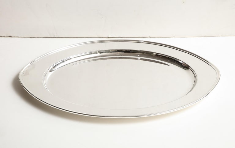 Very large, Art Deco Period, solid sterling silver serving platter/tray, Gorham Manufacturing Company, Providence, Rhode Island, Ca. 1935. Measures 20 1/2 inches long x 14 1/2 inches deep x 1 inch high when lying flat. Weighs 62 Troy ounces. Dark