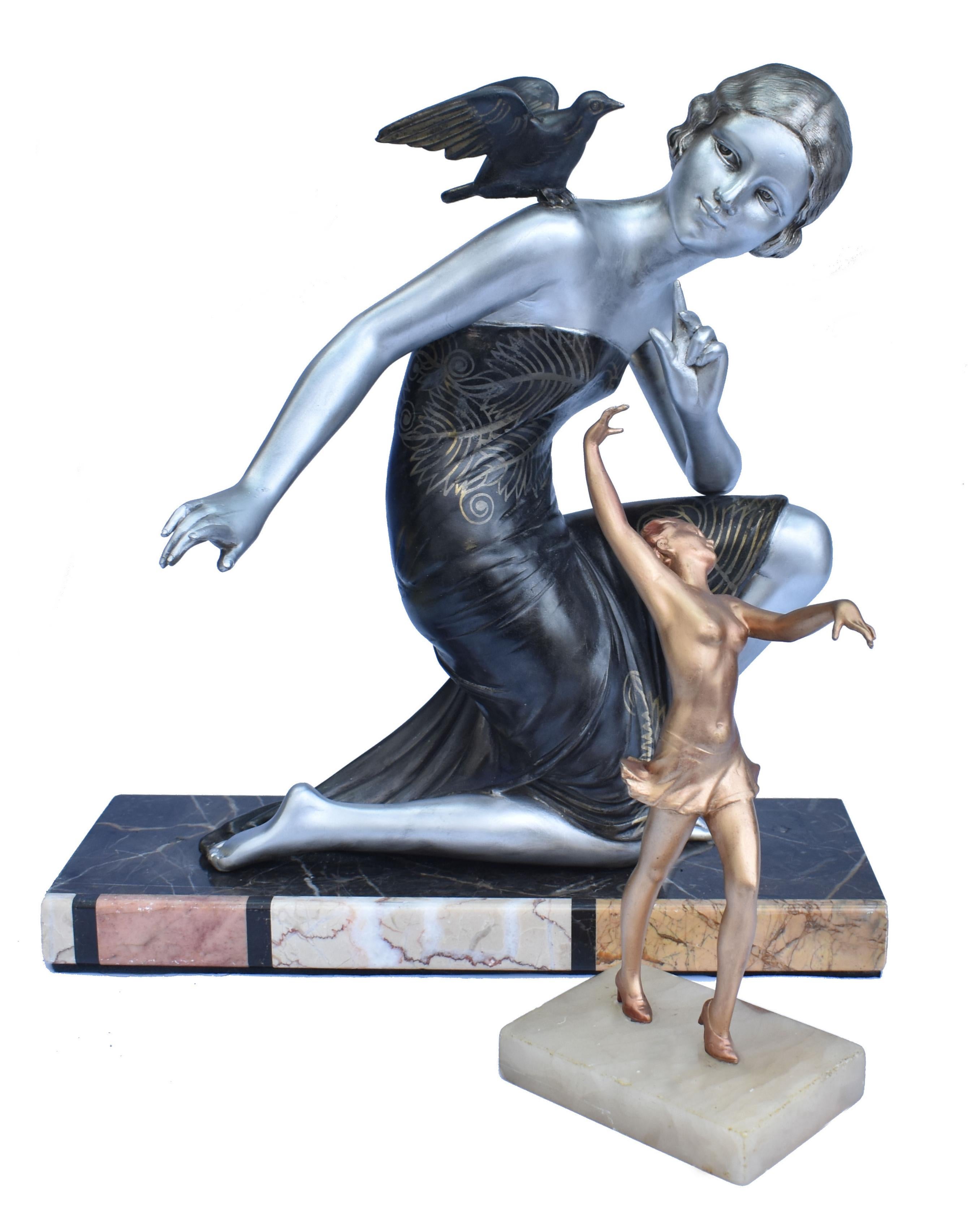 A beautiful and impressively large is this original sculpture from the first half of the last century by Ugo Cipriani. Depicting a figure of a woman with a bird on her shoulder. The sculpture is signed on the base URIANO. Made from spelter and cold