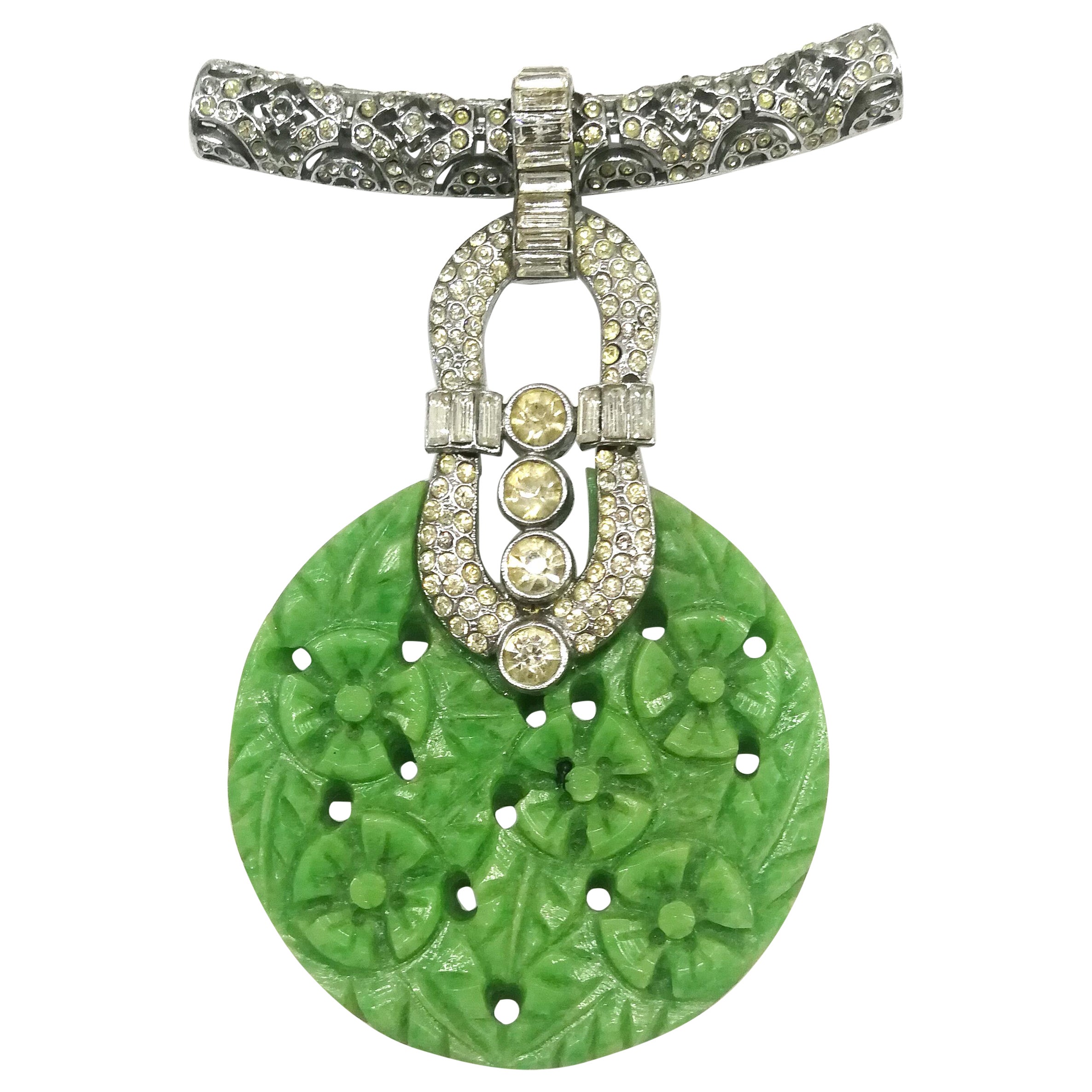 Very large carved Bakelite and clear paste 
medallion
 brooch, France, 1930s