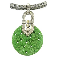 Very large carved Bakelite and clear paste 'medallion' brooch, France, 1930s