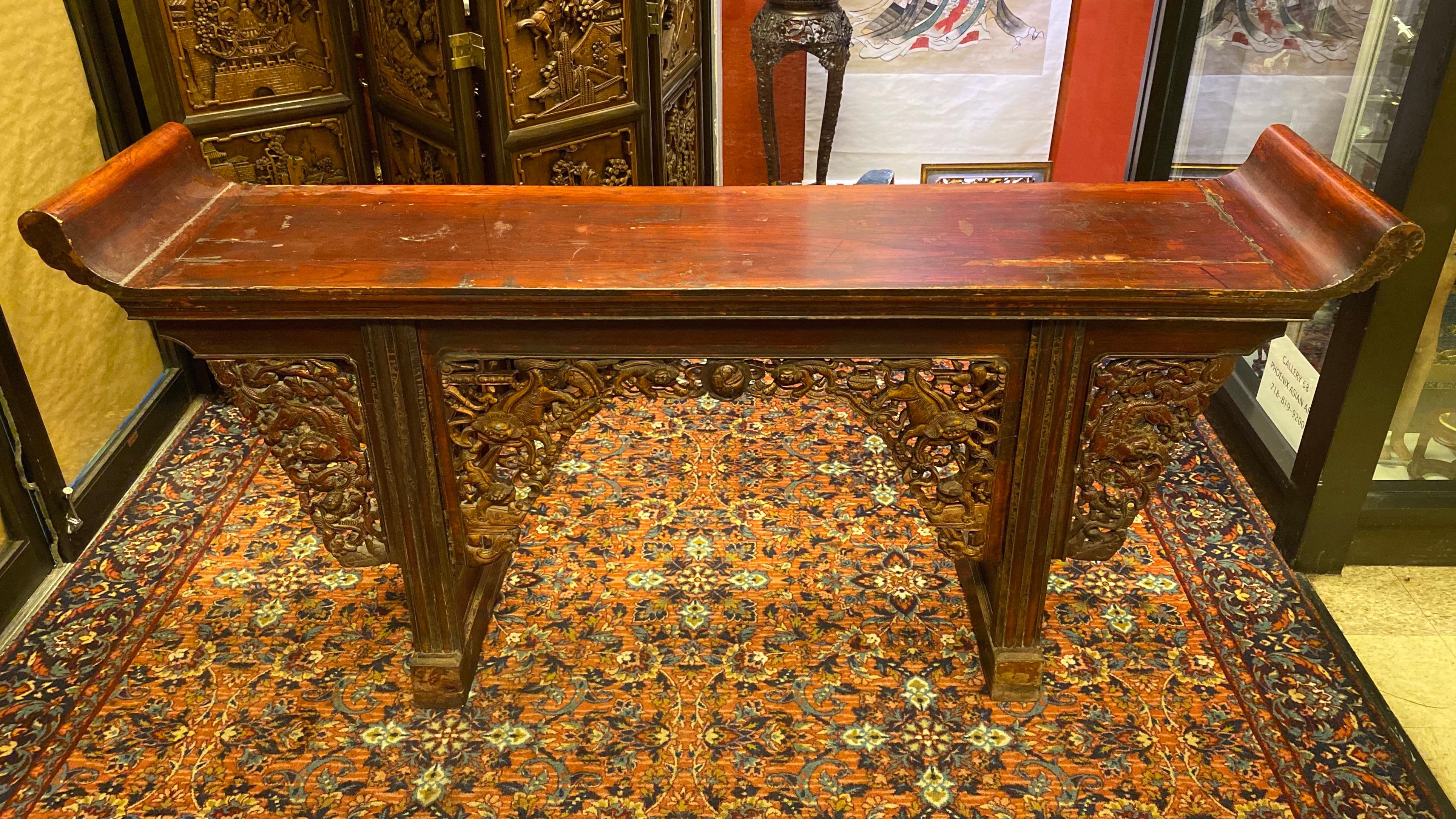 Very large Chinese heavily carved and painted wood console.
