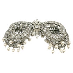 Very large clear paste and pearl 'bow' brooch, Roger Jean-Pierre, France, 1960s