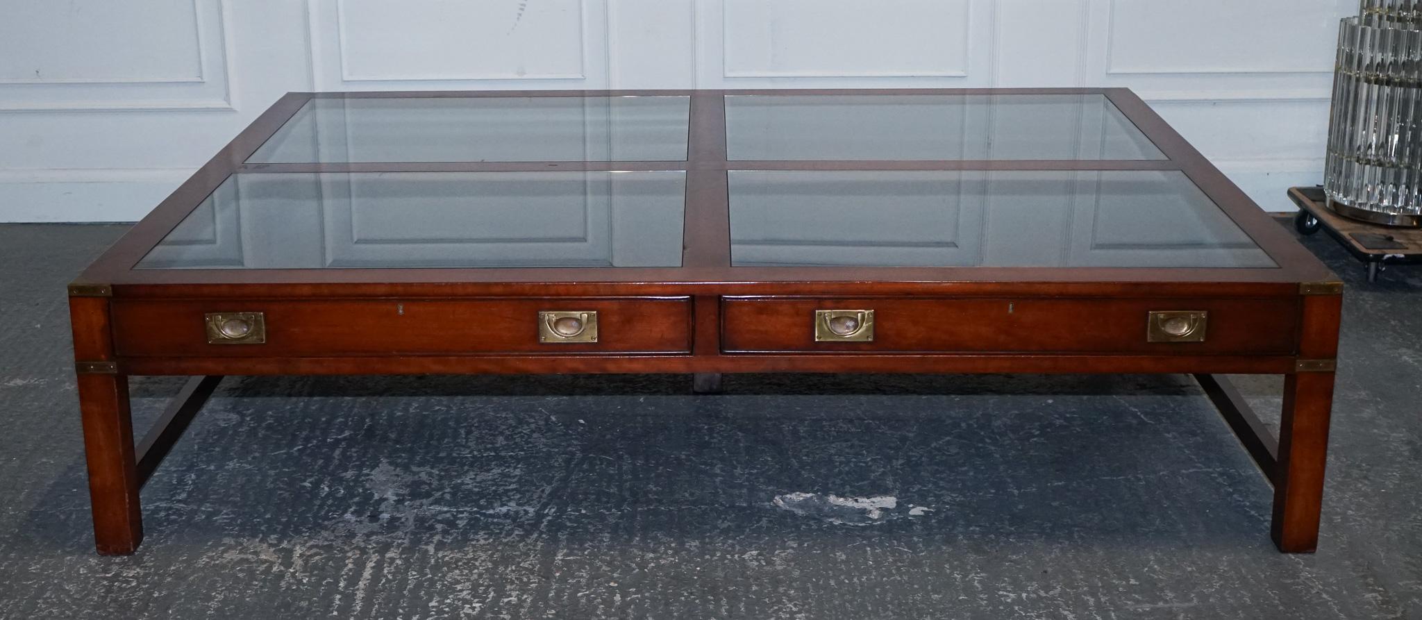 
Antiques of London

We are delighted to offer for sale this Substantial-sized Coffee Table Crafted by Kennedy Harrods.

 A statement piece of sophisticated design and elegant functionality. Its generous dimensions make it a commanding presence in