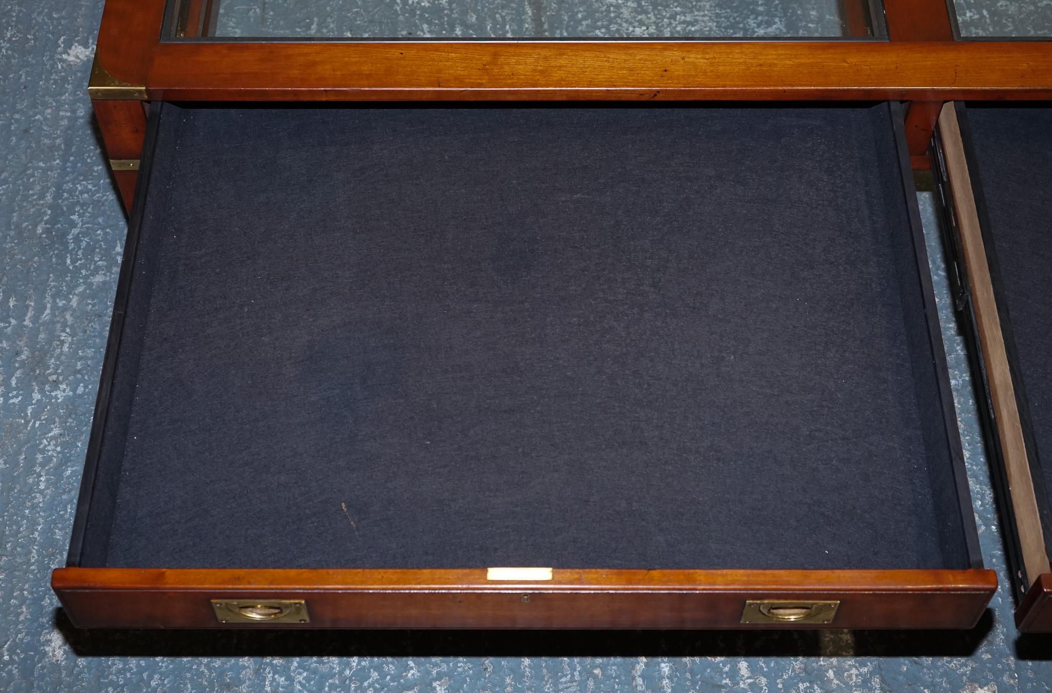 Brass VERY LARGE COFFEE TABLE WITH INLAiD GLASS PANELS  MADE BY KENNEDY HARRODS For Sale