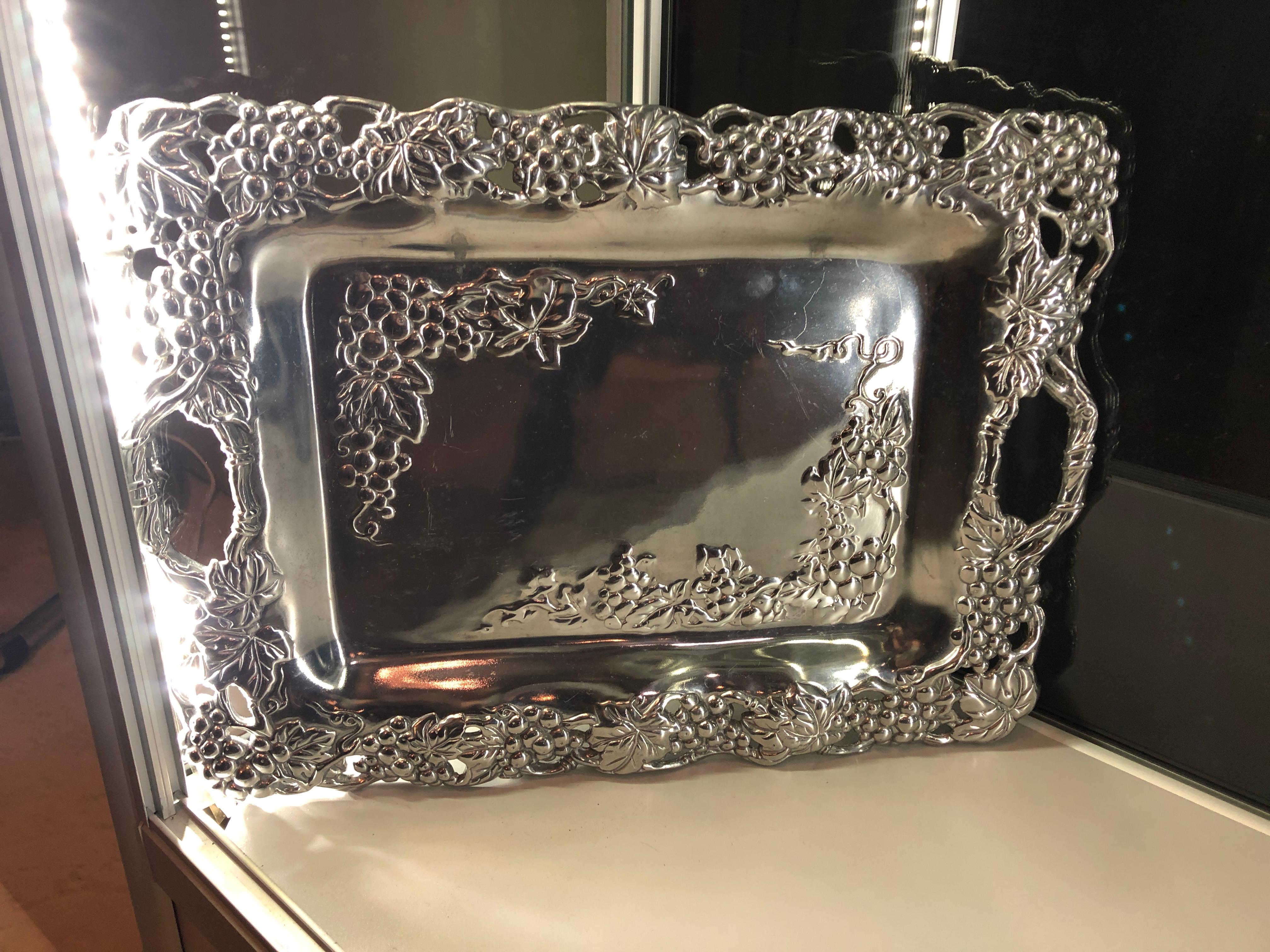 Very large collection of Arthur Court Pewter trays, candle sticks, serving pieces, sugar and creamer set etc. Some twenty-seven pieces most signed Arthur Court and dated. Can purchase one or all available. Please ask for a complete list prior to