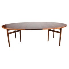 Very large Danish extendable dining table in Rosewood model 212 by Arne Vodder.