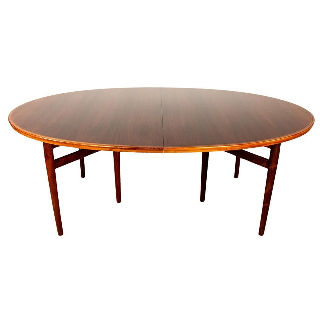 Very large Danish extendable dining table in rosewood model 212 by Arne Vodder. For Sale