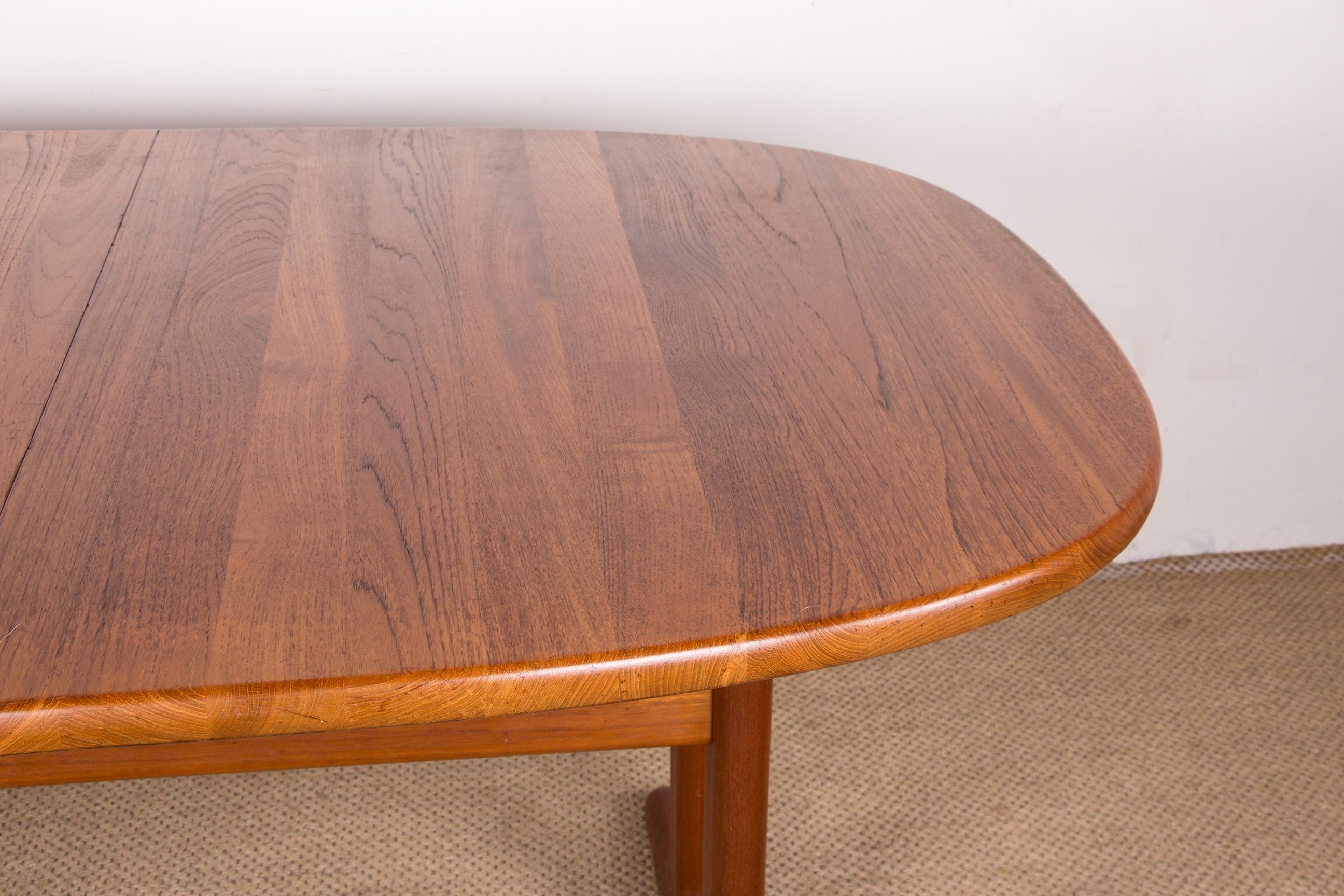 Scandinavian Modern Very large Danish oval extendable dining table in solid Teak by Glostrup.