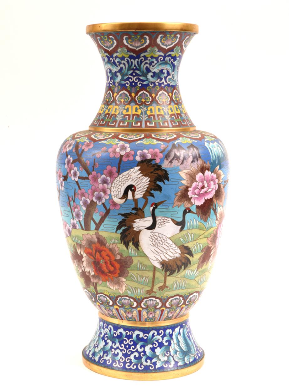 Very large decorative Cloisonné with blossom flowers and birds design details vase / piece. The Cloisonné vase is just exquisite and would bring a great addition to any decor. The piece is in excellent condition. It measures about 25 inches high x