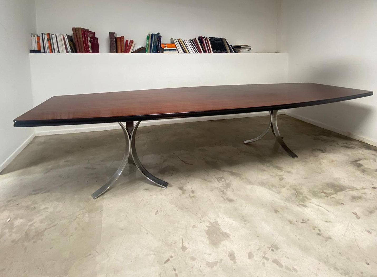 Amazing huge dining table or conference table. Beautiful large wood top and elegant sculptural metallic legs.