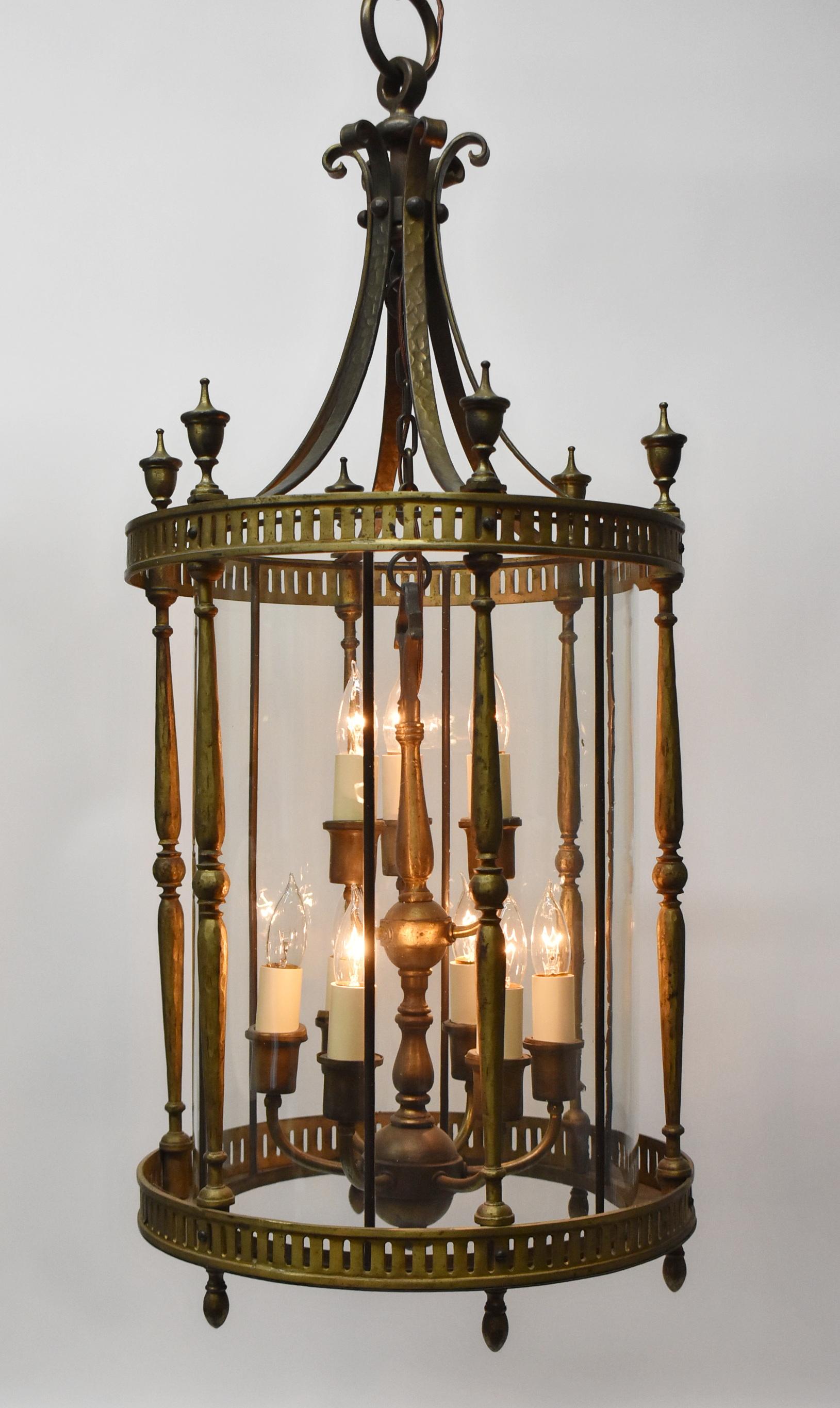 A large heavy bronze cylindrical lantern. This fixture is 40