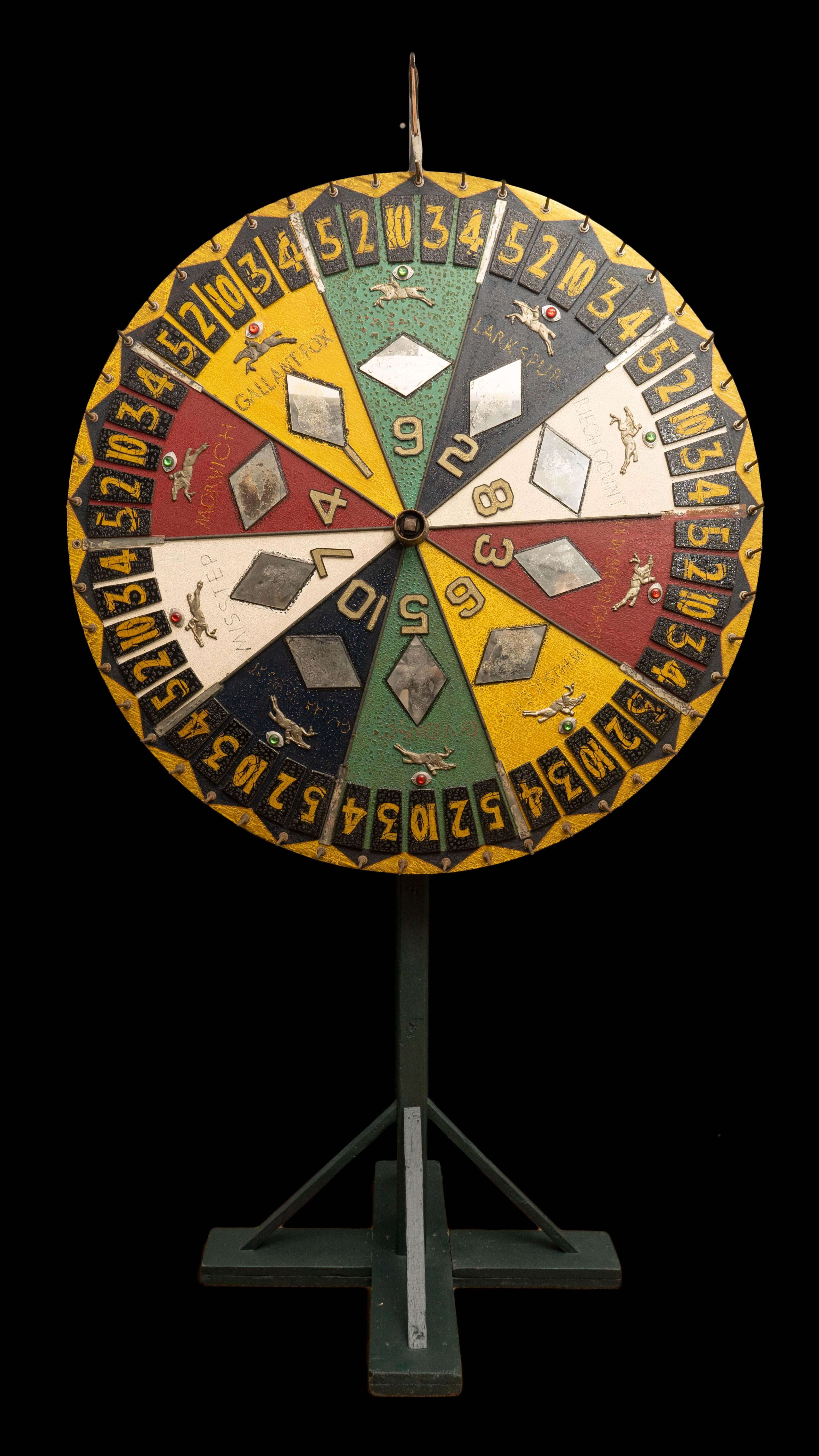 Very large early 20th Century carnival horse racing betting wheel. Wheel of fortune. Wheel of luck.

Measures: 54