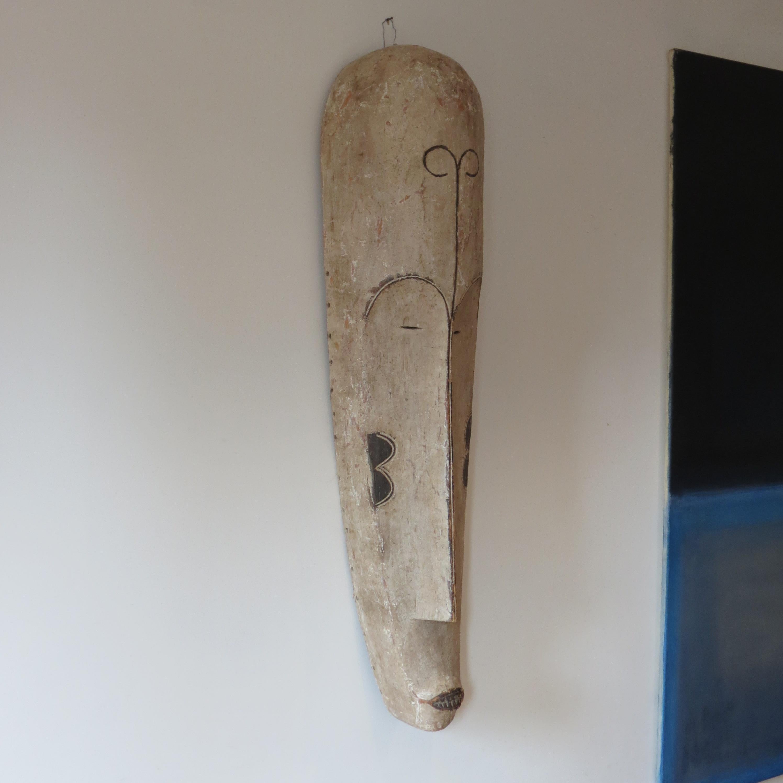 Very large Elongated Tribal Fang Mask Gabon Wall Hanging Tribal Mask In Good Condition For Sale In Stow on the Wold, GB