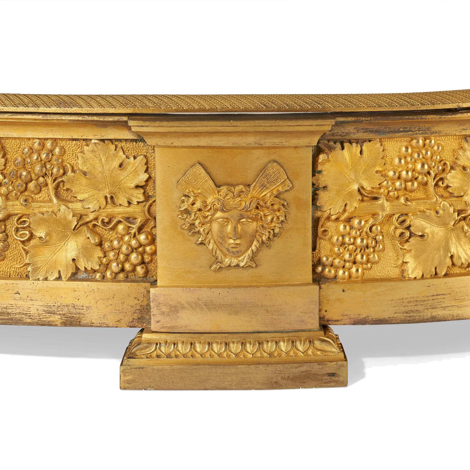 Finest quality and very large early 19 century French 1st Empire period ormolu bronze four section surtout de table.
   