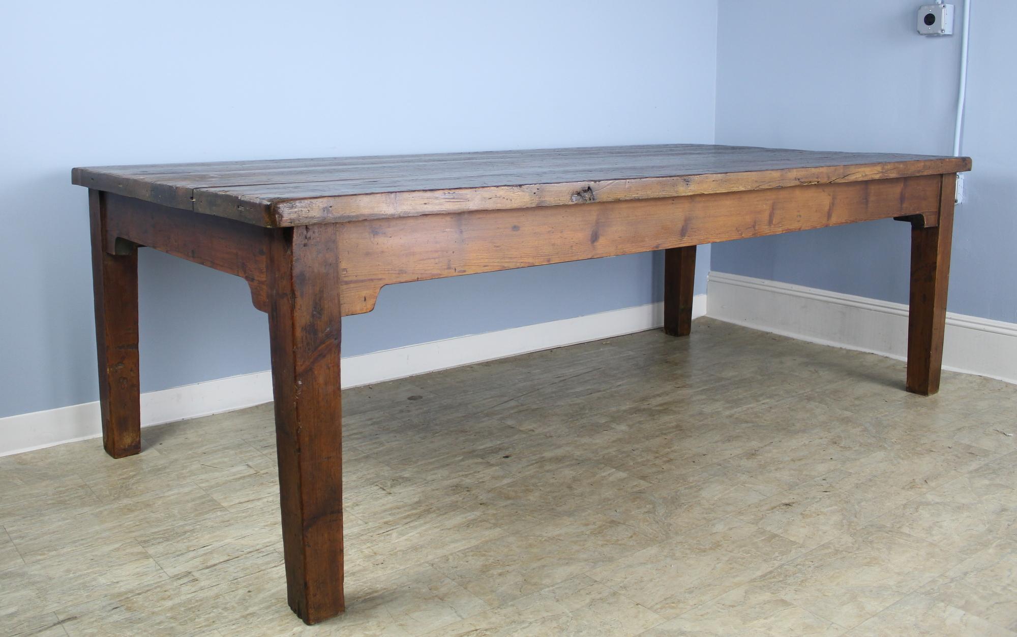 A spectacular pine farm table, with a 1.75
