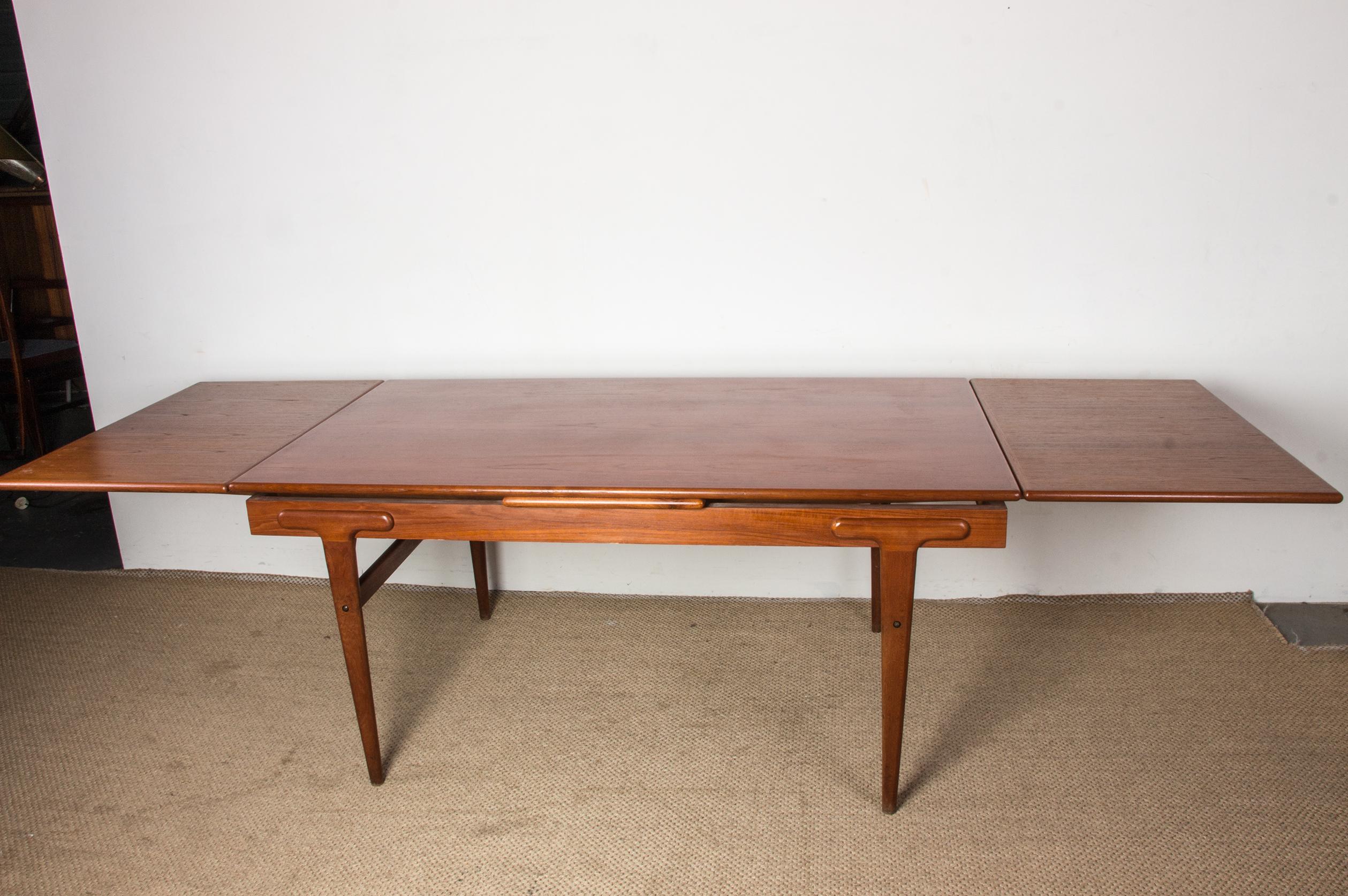 Very large extendable Danish teak dining table by Ejvind Johansson for Ivan Gern 4