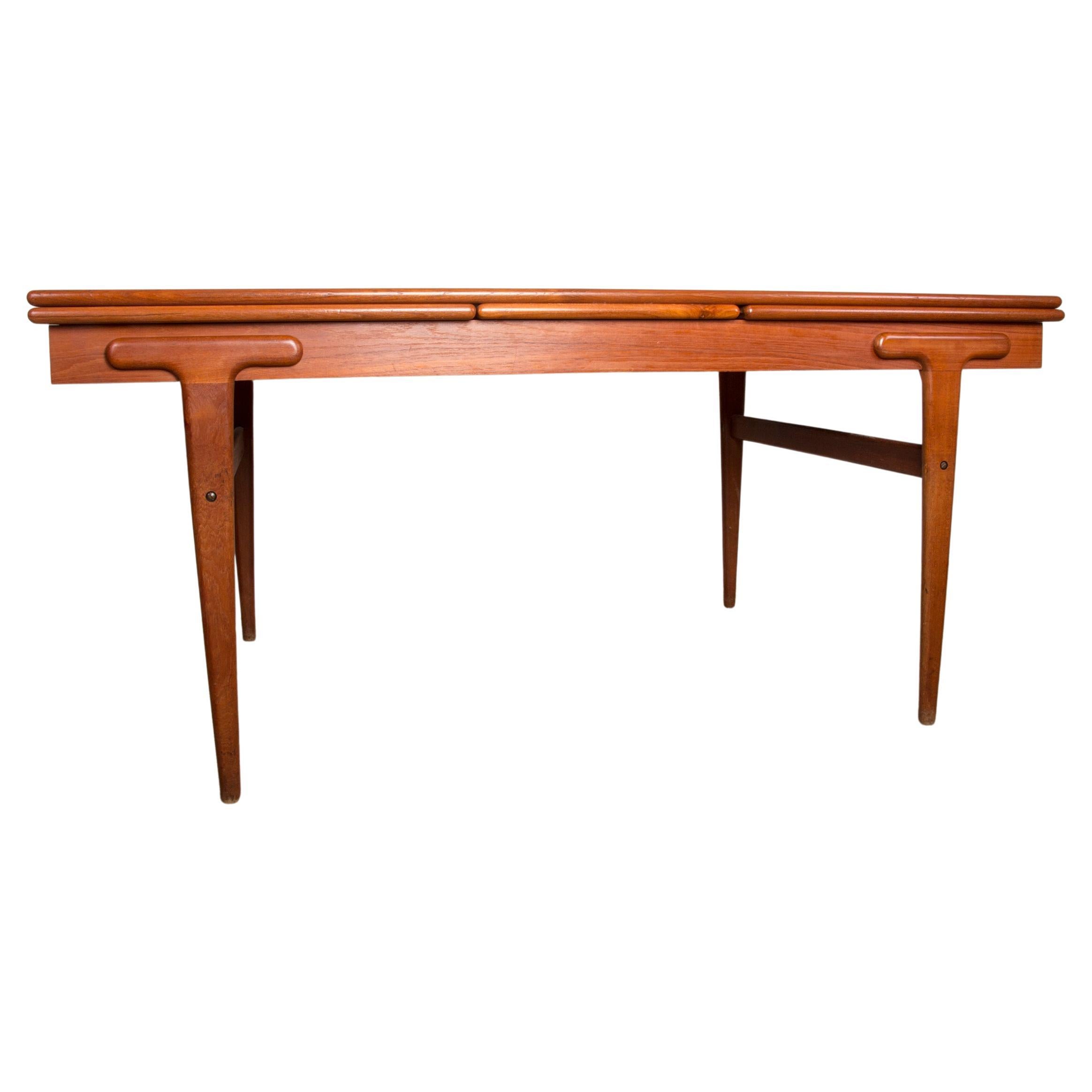 Very large extendable Danish teak dining table by Ejvind Johansson for Ivan Gern