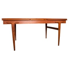 Very large extendable Danish teak dining table by Ejvind Johansson for Ivan Gern