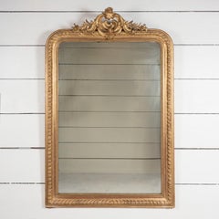 Very large French carved Regency style mirror with small pediment