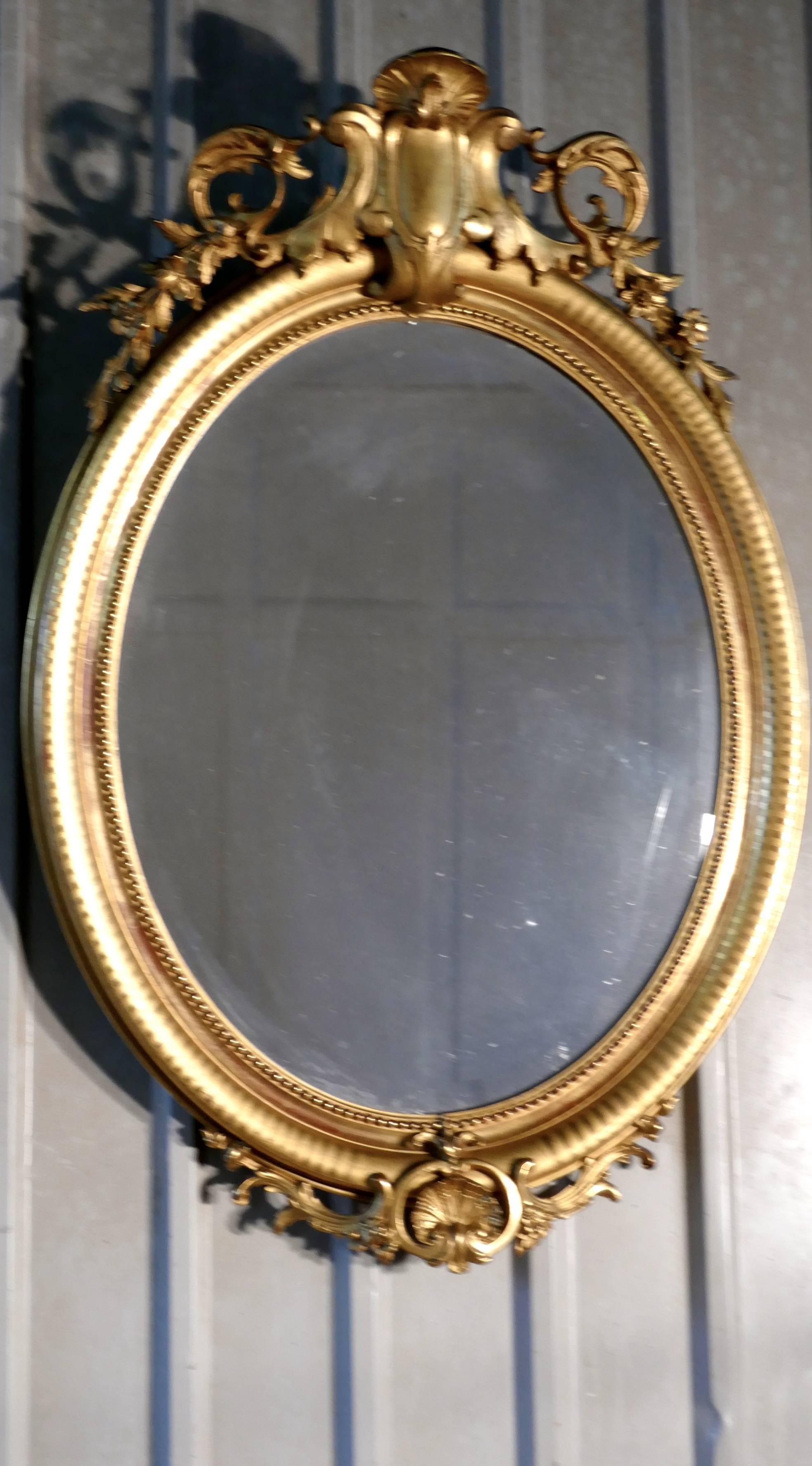 Rococo Très grand miroir mural rococo ovale doré français en vente