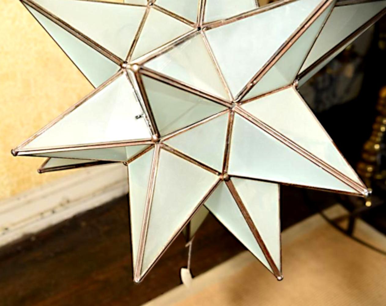 A very large and beautiful, handmade and electrified, frosted glass Moravian star lighting fixture.
