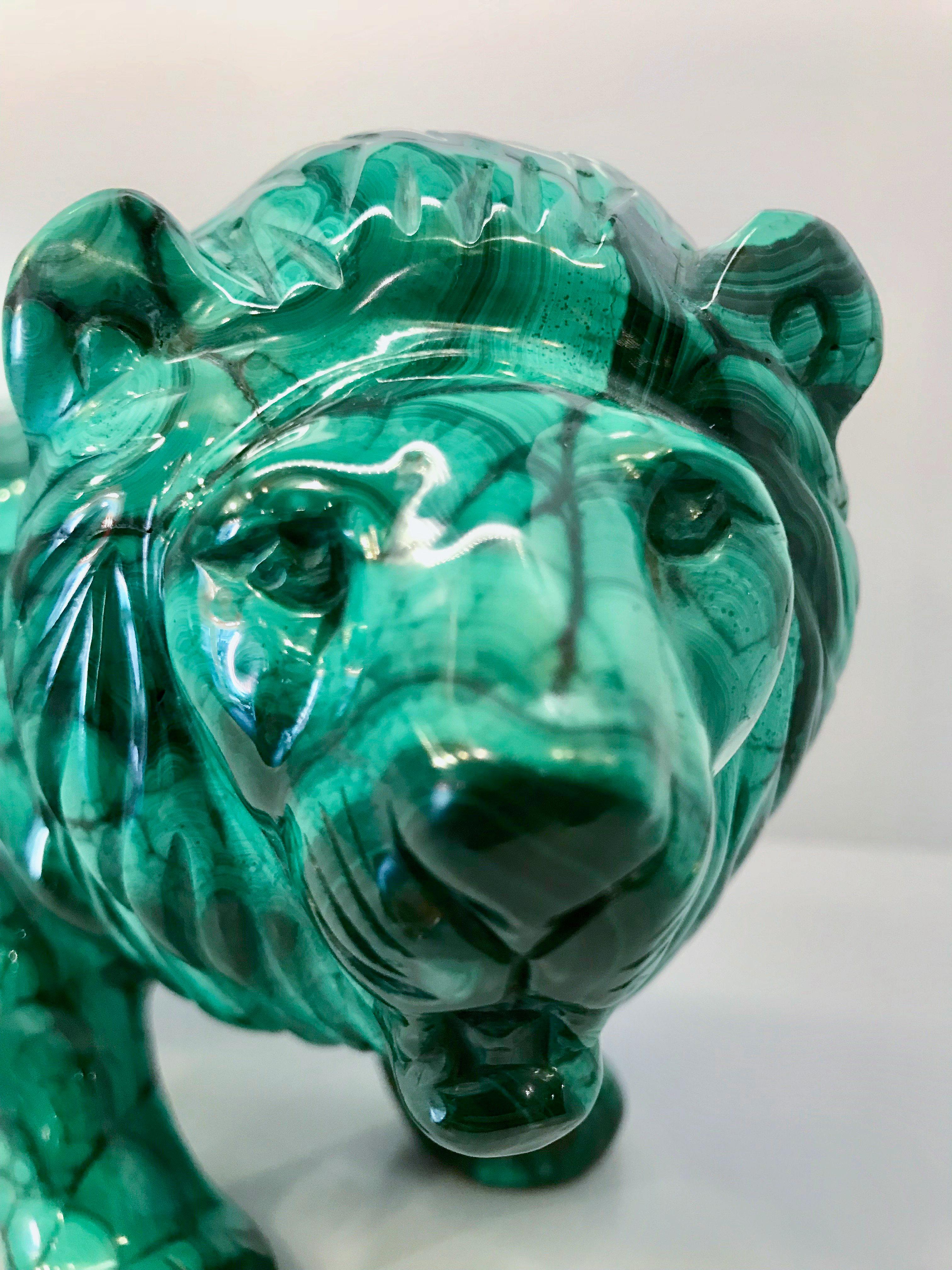 Very large carved Malachite African lion. This piece was hand-carved in the Congo out of one solid piece of malachite.