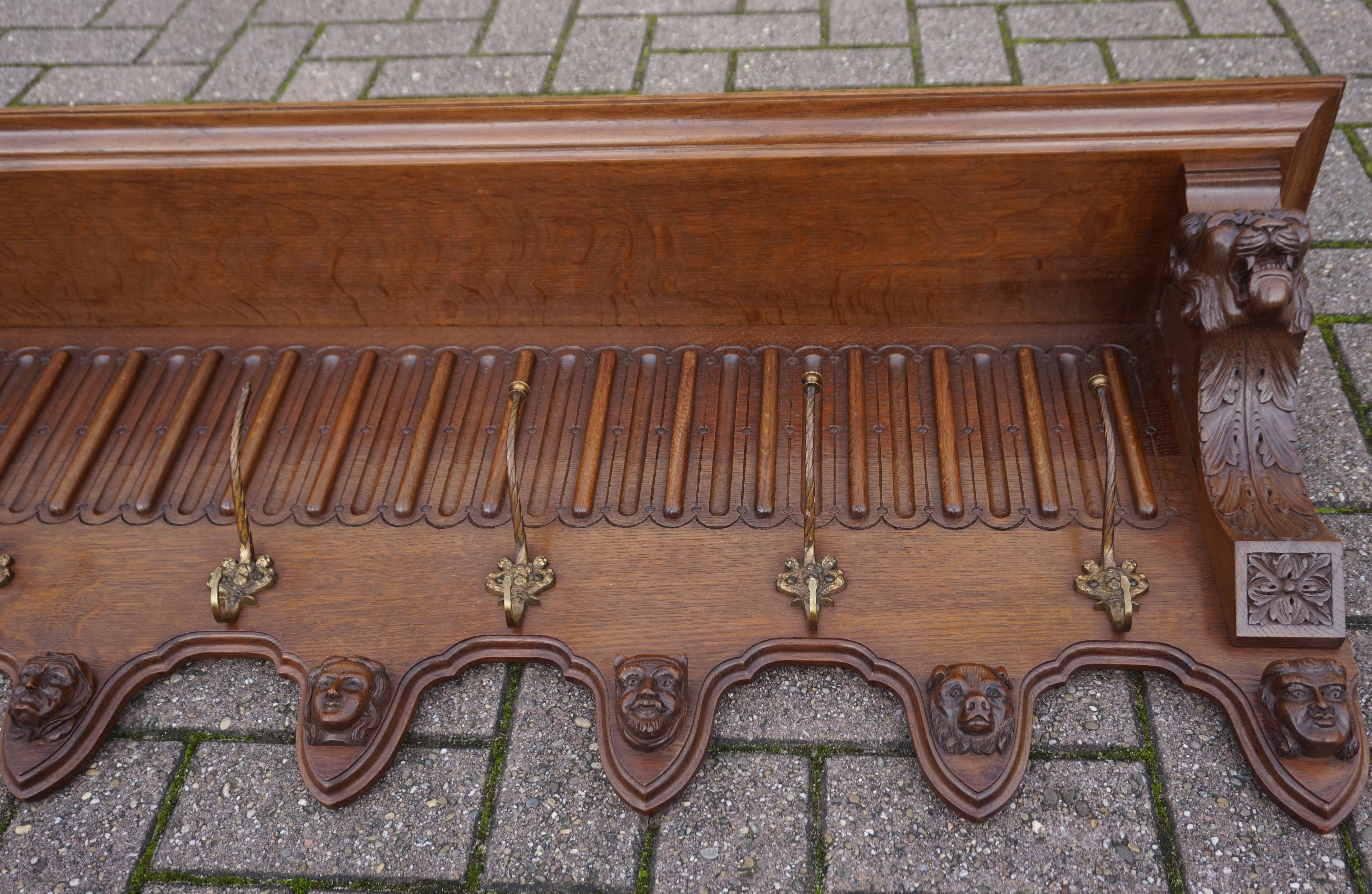 19th Century Very Large Hand Carved Oak Wall Coat Rack with Lion & Grotesque Mask Sculptures