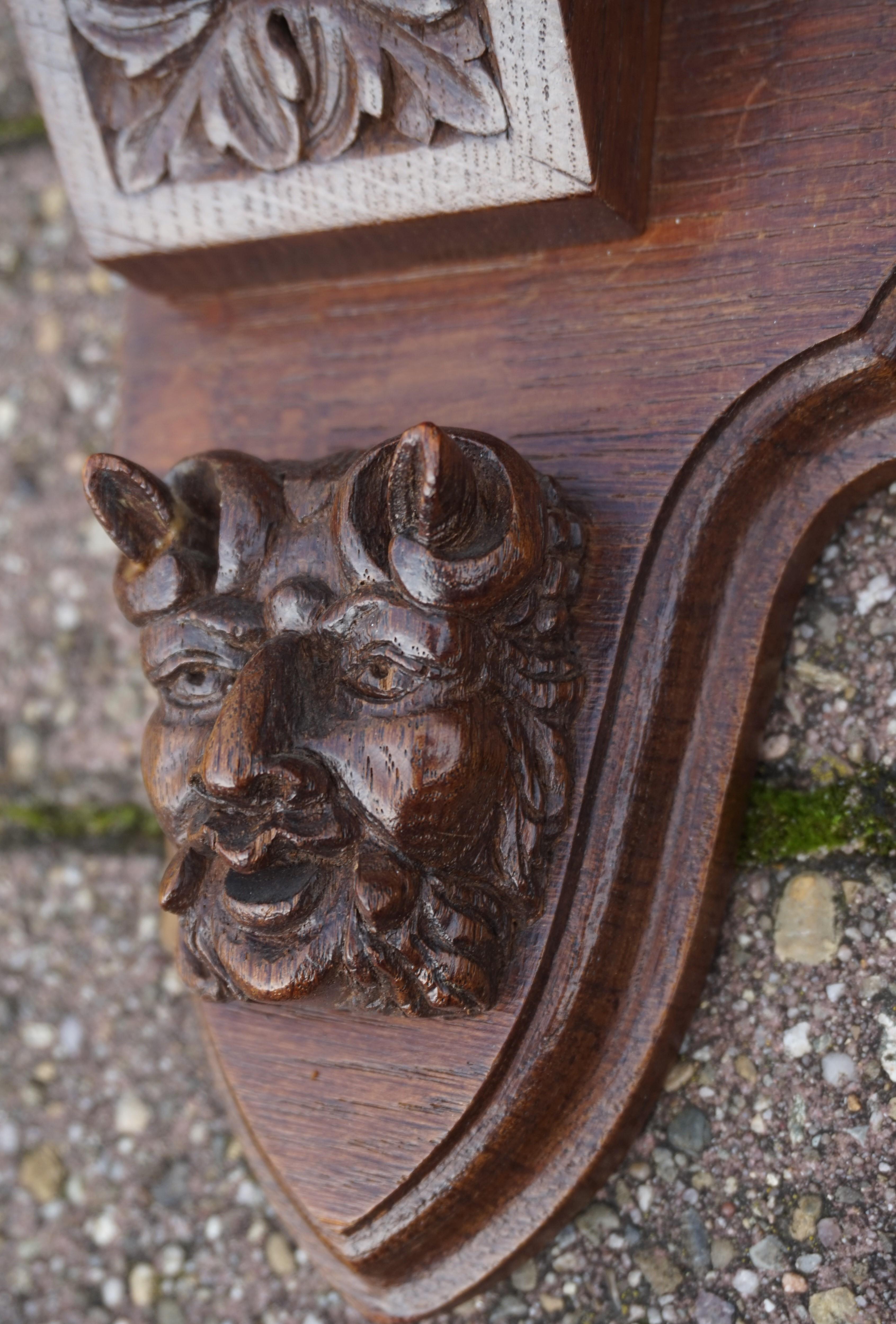 Renaissance Revival Very Large Hand Carved Oak Wall Coat Rack with Lion & Grotesque Mask Sculptures