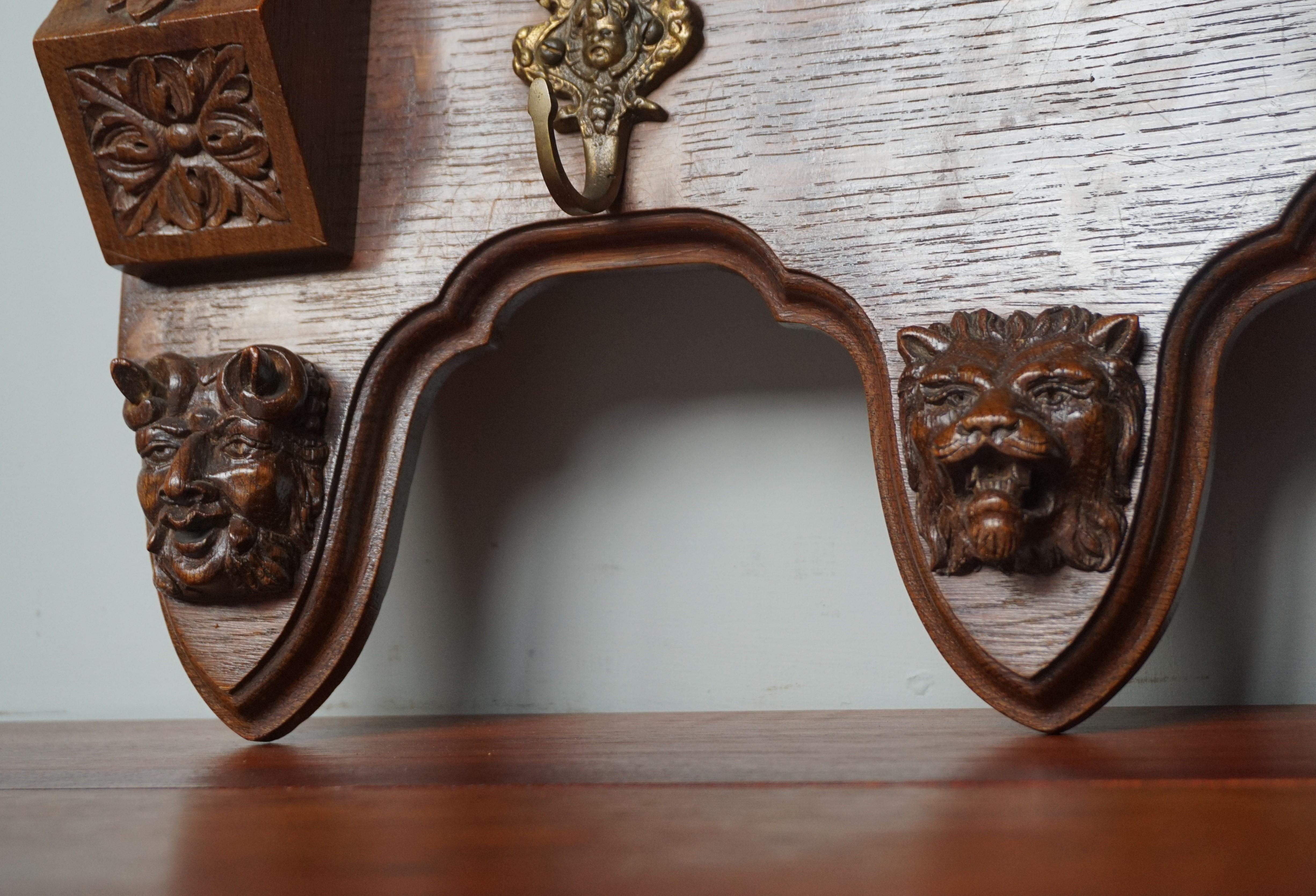 Dutch Very Large Hand Carved Oak Wall Coat Rack with Lion & Grotesque Mask Sculptures