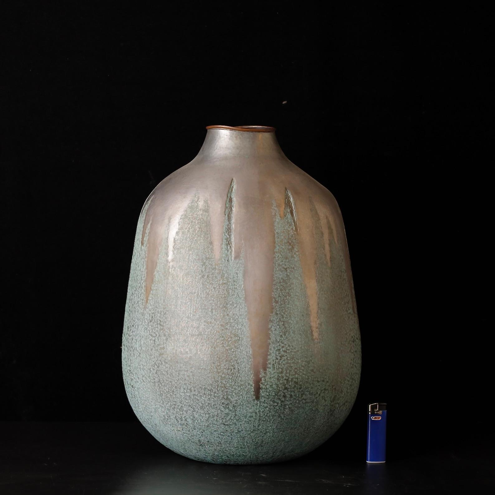 Stunning extremely large , hand hammered copper vase. Signed  
Tsuiki Copperware is a traditional Japanese craft . 
Tsuiki Is a metal working technique that is derived from the words ' Hammer ' and 'raise' 
A variety of tools are used to create