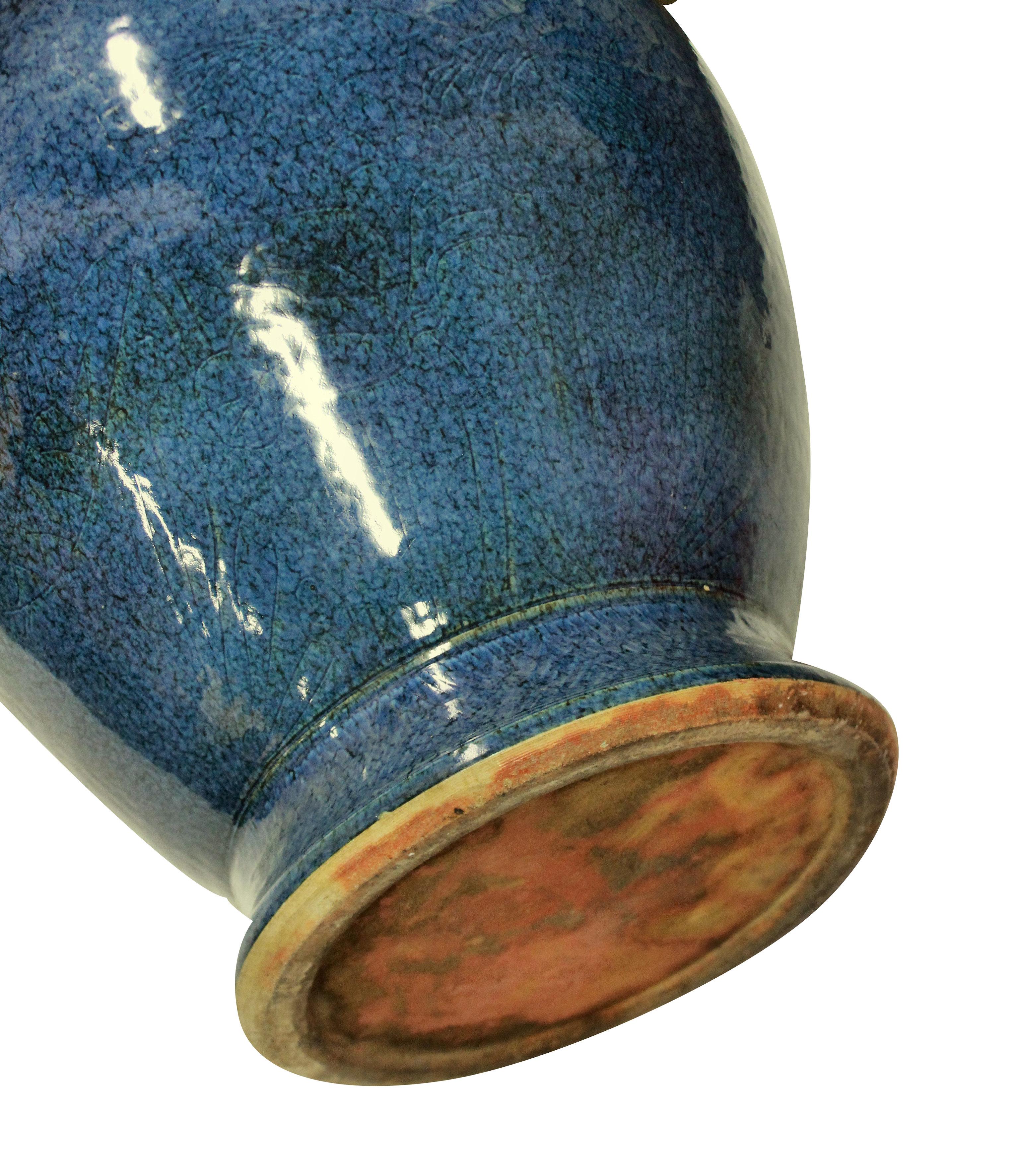 A large and impressive Chinese blue ground glazed vase, with a crackle lustre finish.
