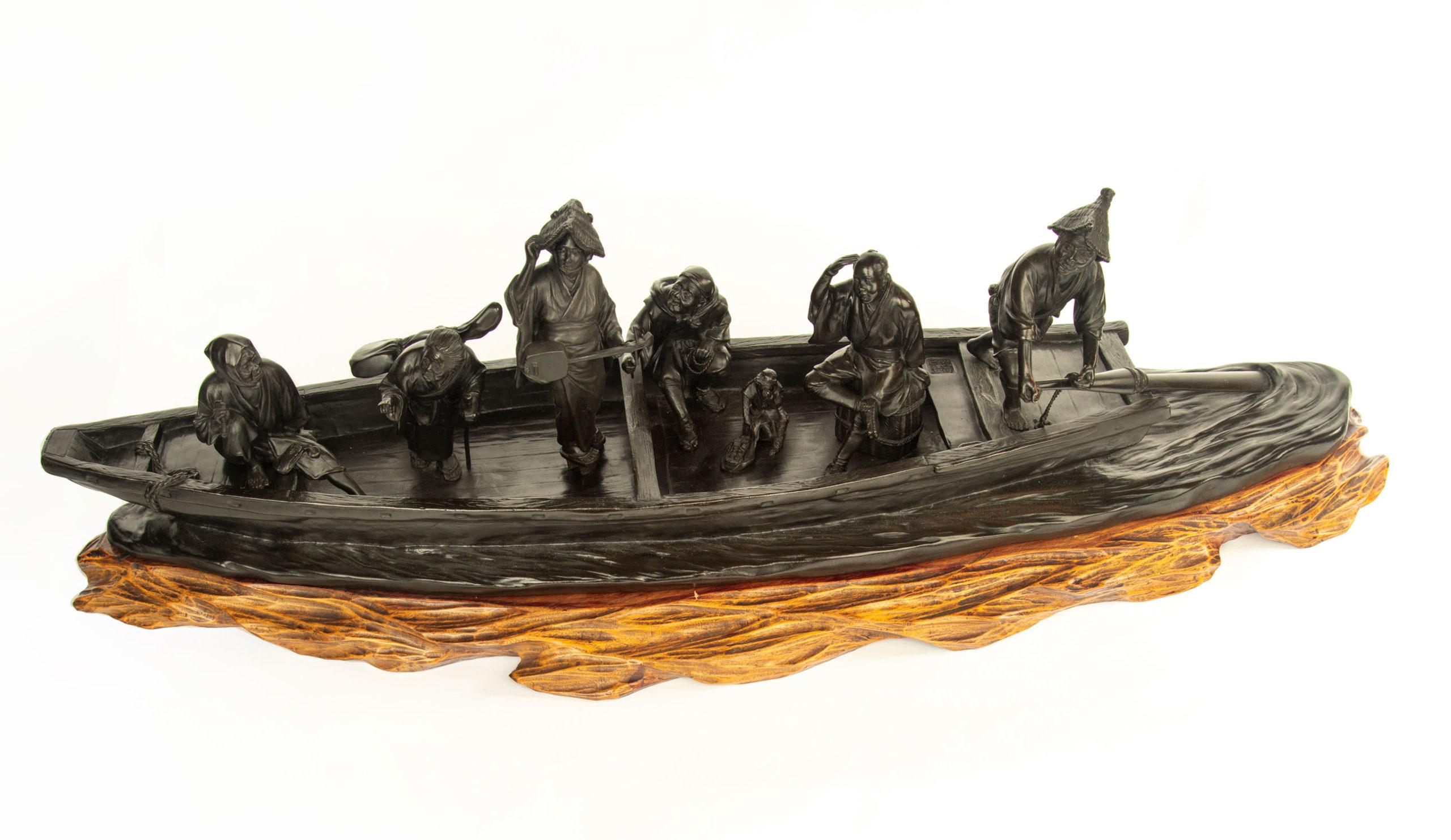 As part of our Japanese works of art collection we are delighted to offer this most unusual large scale Meiji Period 1868-1912, bronze casting of a wooden ferry boat carrying passengers upon a river, this most unusual casting stems from the foundry