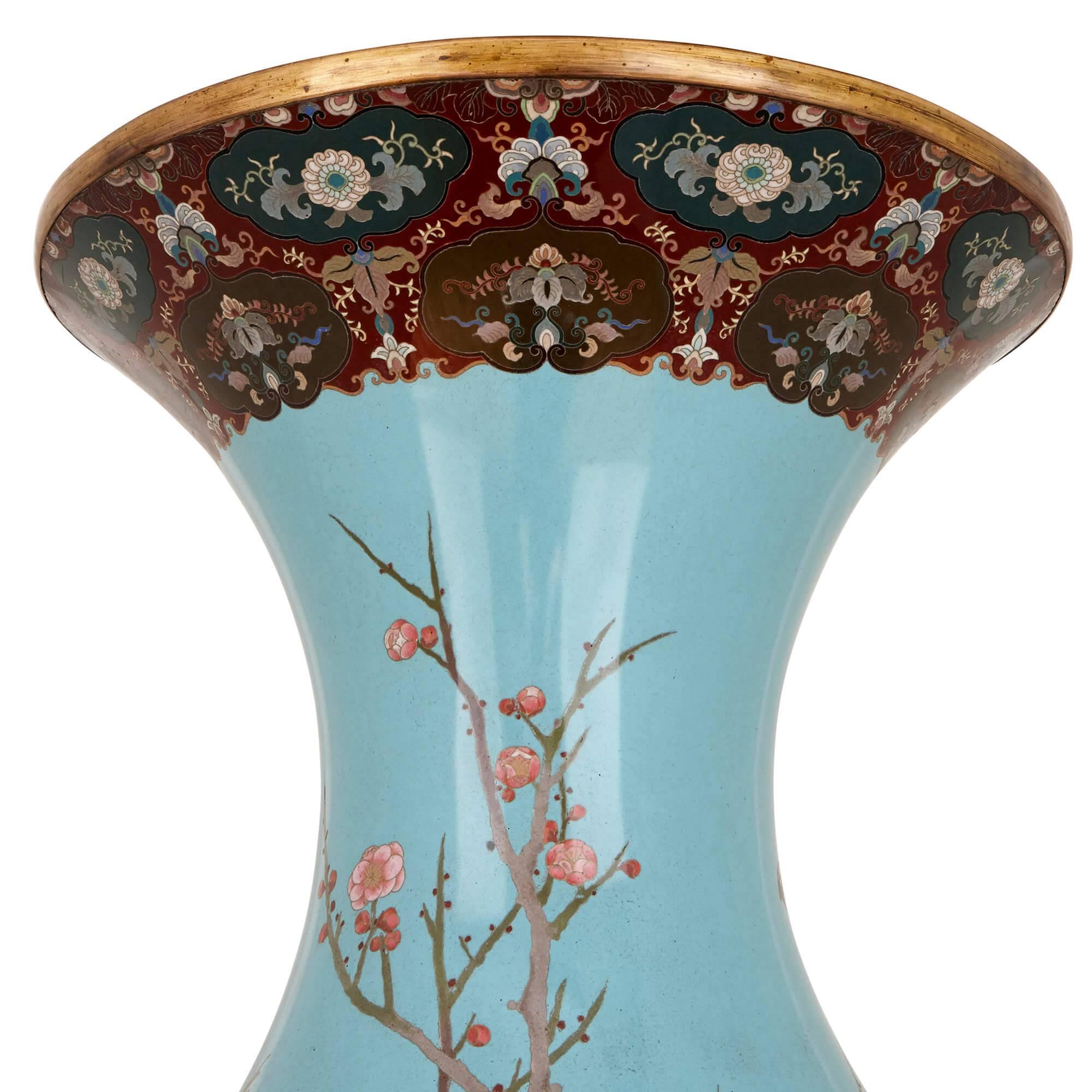 The Japanese Meiji period was known as the Golden Age of cloisonne enameling, for the many beautiful works of exceptional quality that it produced. This vase, exceptionally large in size and yet refined and elegant in proportion, demonstrates the