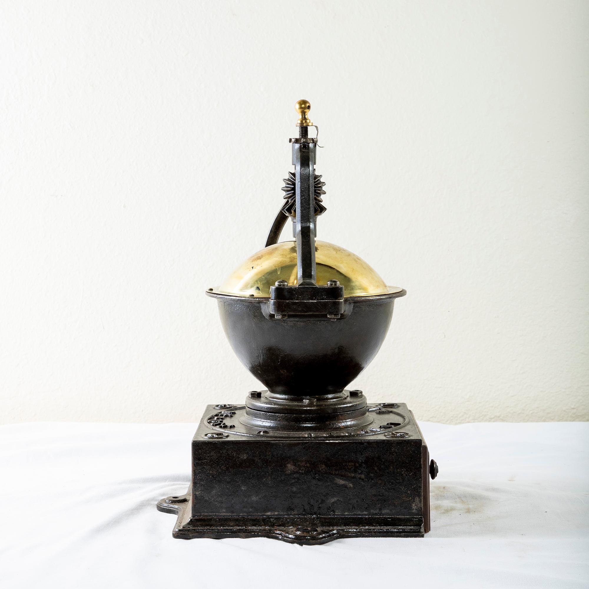 antique brass coffee grinder