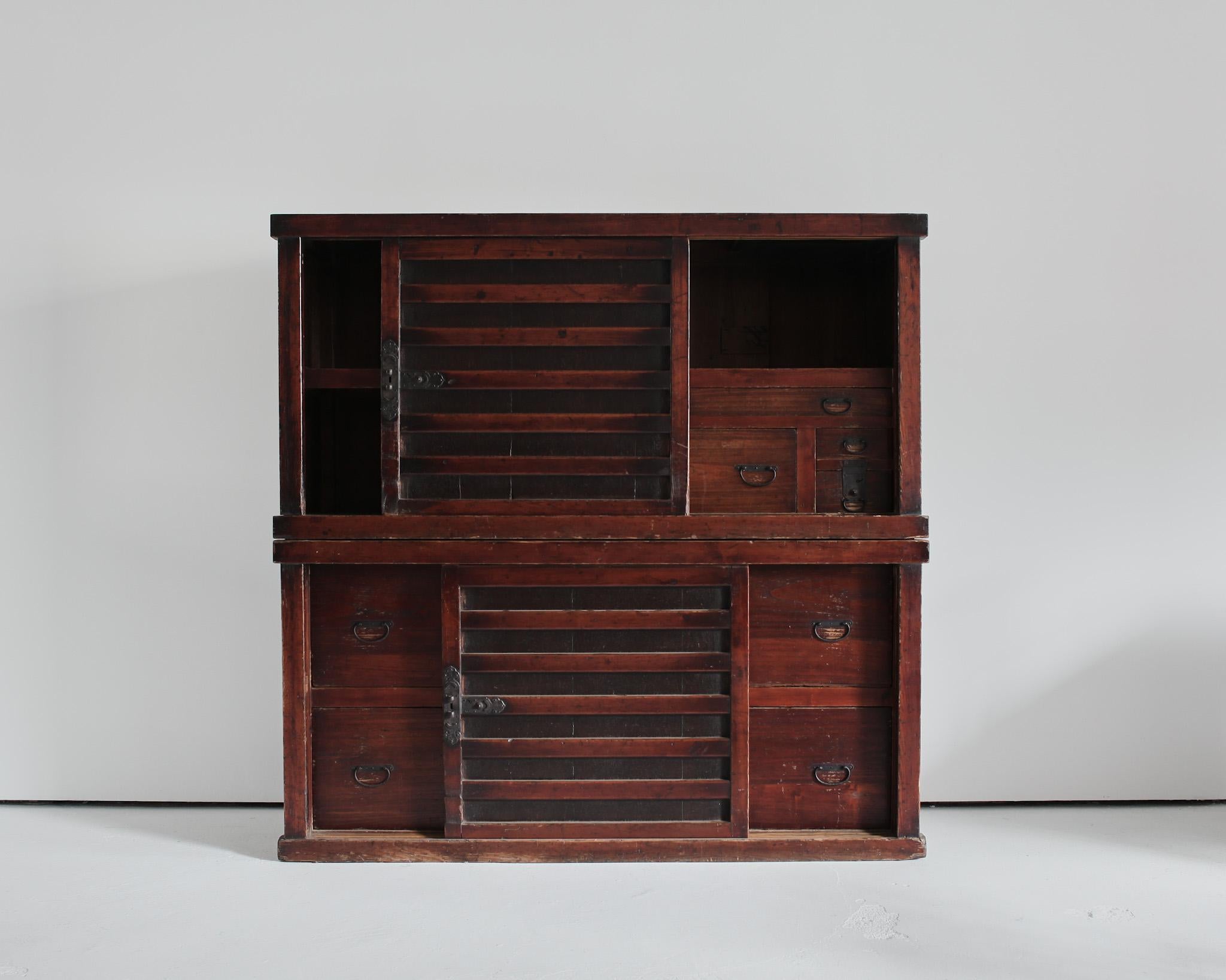 A very large late Edo/early Meiji period two part tansu.

 

Constructed in a combination of cedar & pine with original iron hardware.

 

Nicely patinated through years of use.

 

Huge amounts of storage.

 

Also could be used as
