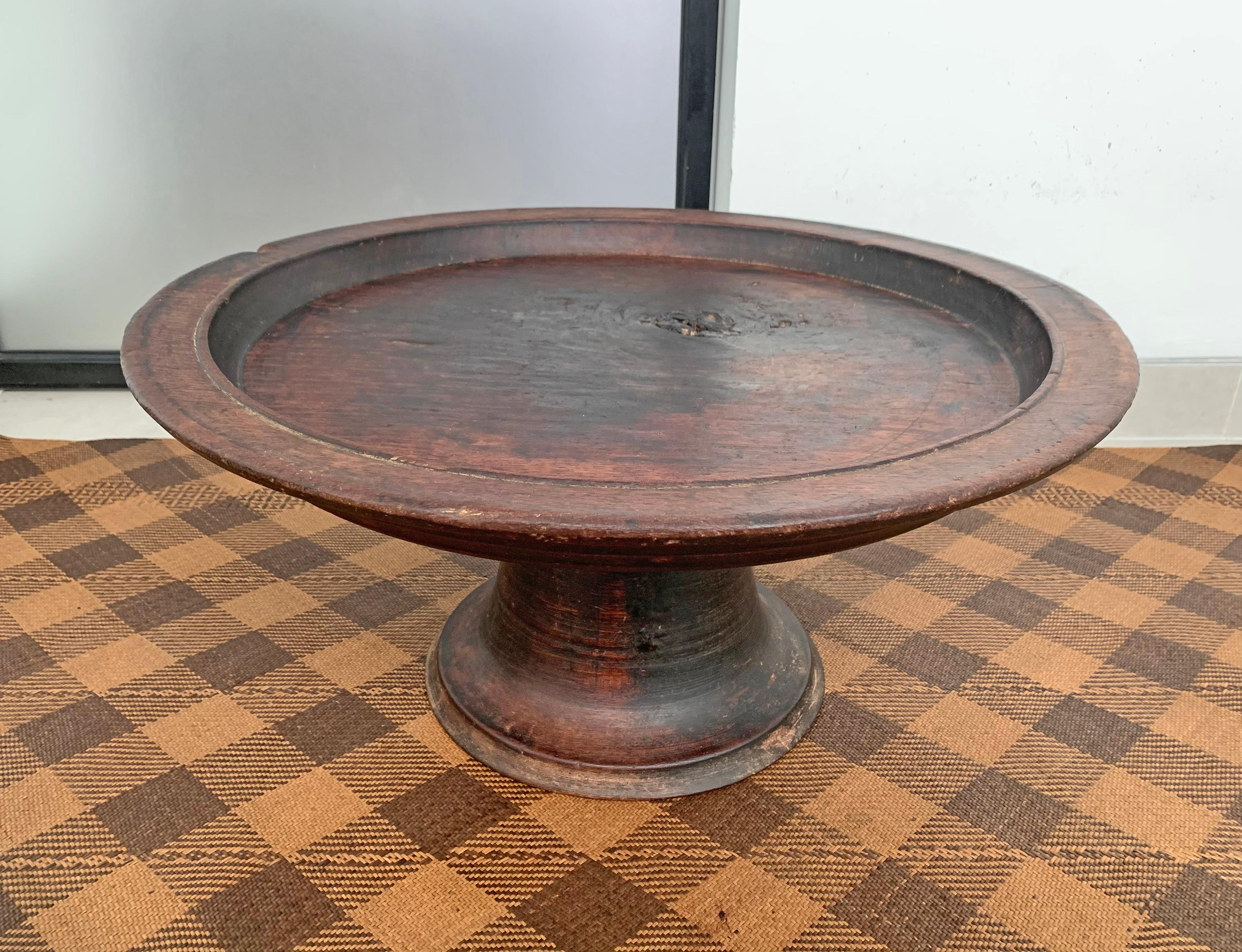 This is an exceptionally large 'Dulang' from Lombok. Dulangs amid Indonesia serve a number of purposes depending on the region they originate from. In Lombok 'Dulang' Tray were used as small tables to share communal/family meals and or display food