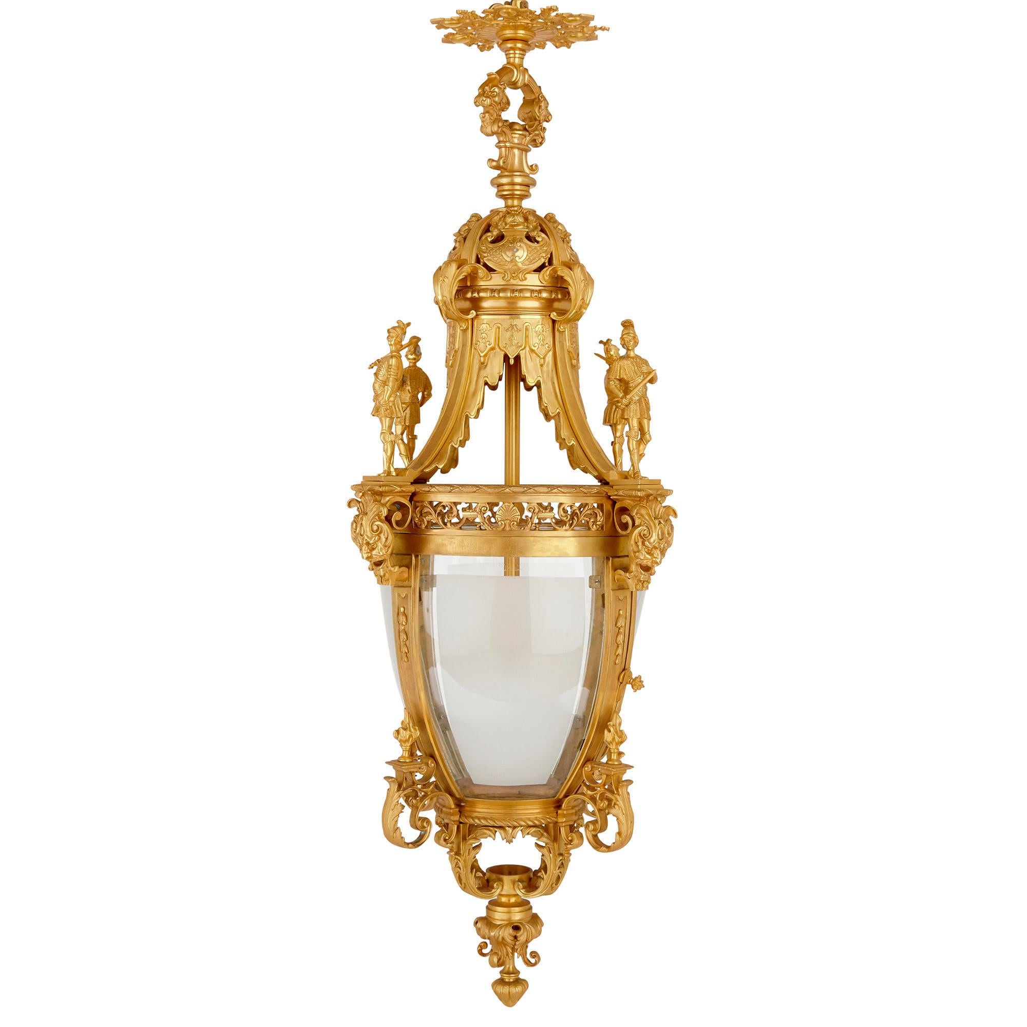 Very large Louis XV style gilt bronze lantern
French, 20th century
Dimensions: Height 160cm, diameter 62cm

This magnificent lantern is crafted from gilt bronze in a wonderfully ornate decorative style. The lantern features a lightbox comprised