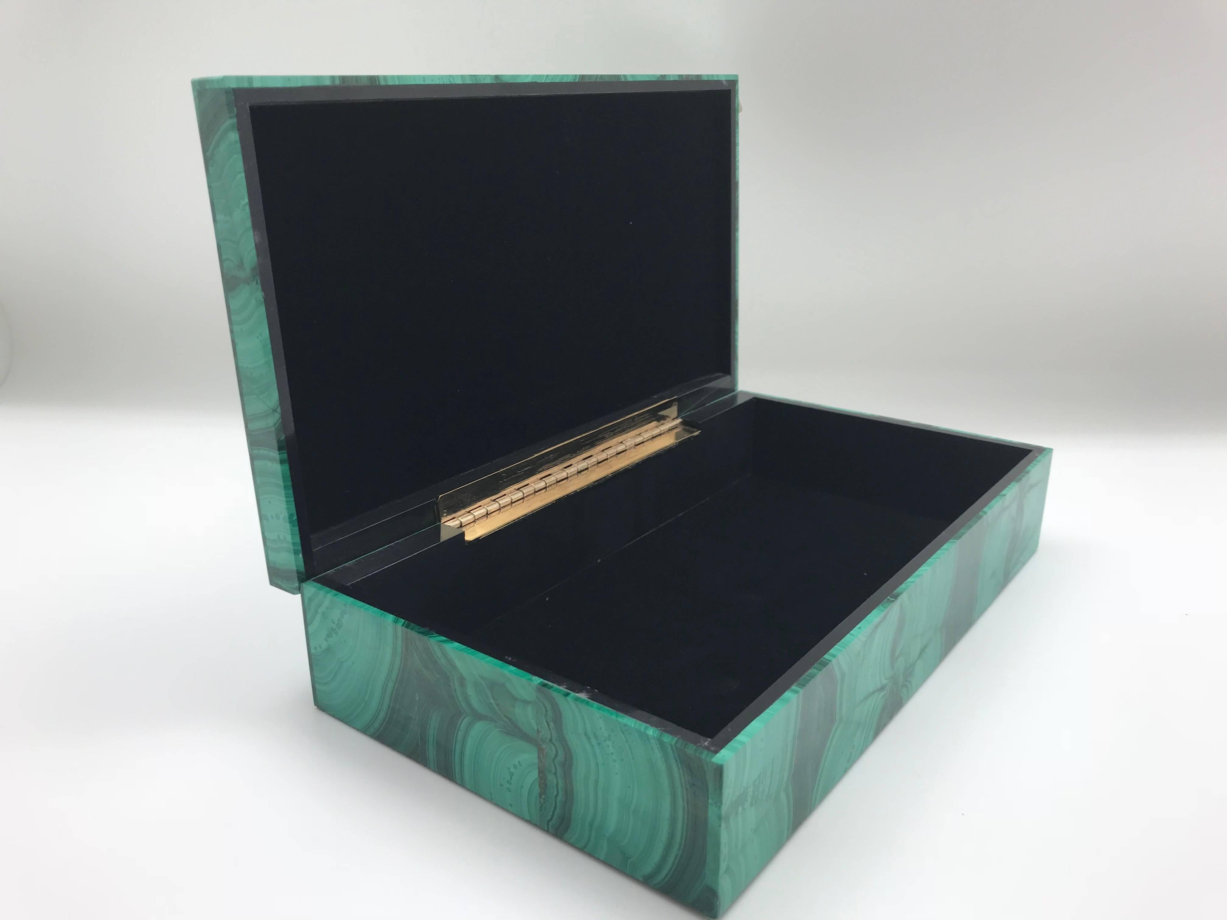 The malachite for this box was sourced from the Congo, where the finest quality of this mineral is currently found. Malachite from the 18th and 19th century was also sourced from Russia. Boxes, such as this, were typically brought back from Europe