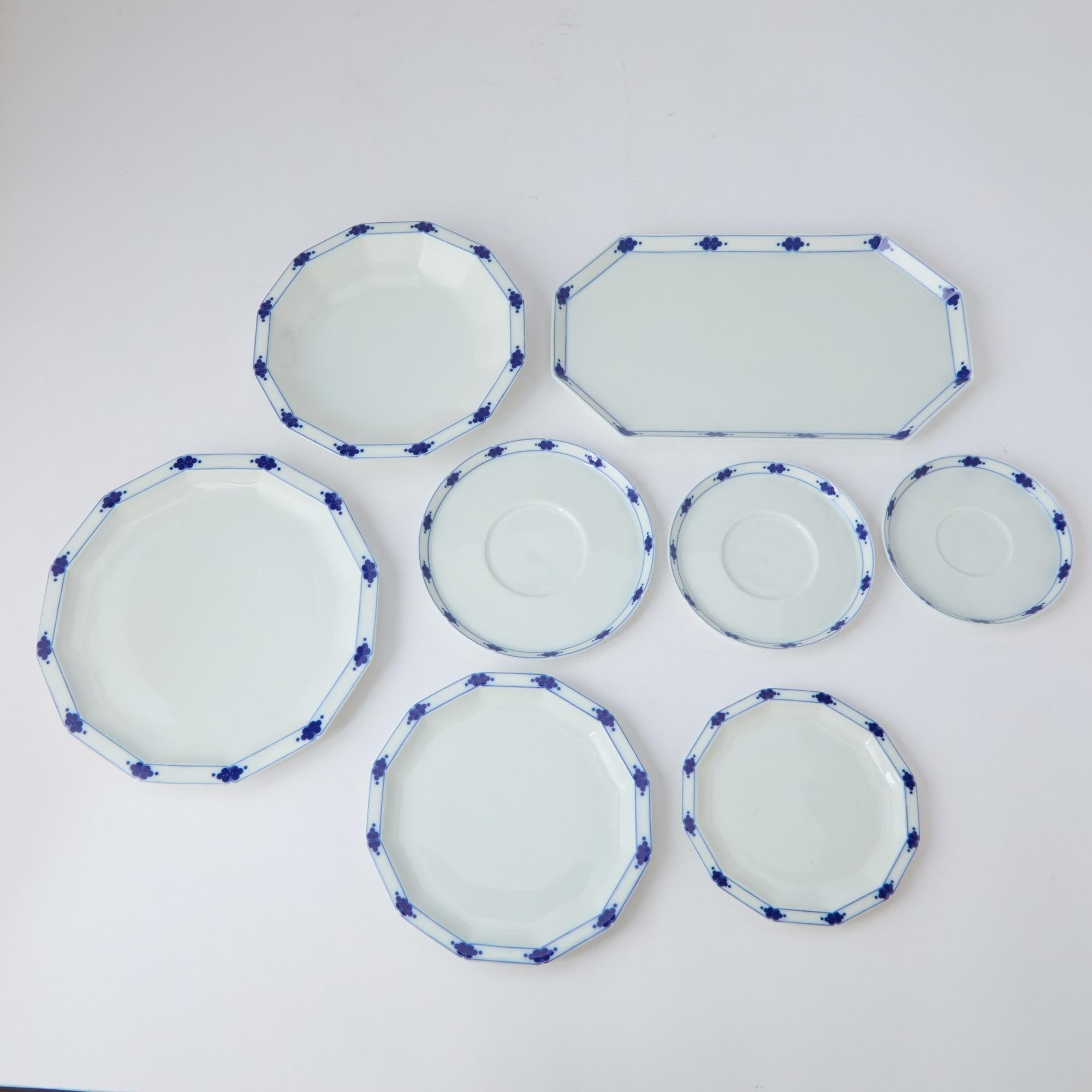 An exceptional mid-20th century porcelain dinner service by Rosenthal Studio-Line, Germany, designed for twelve and showcasing the refined aesthetic of post-war European craftsmanship. This extensive service features a beautiful mid-century modern
